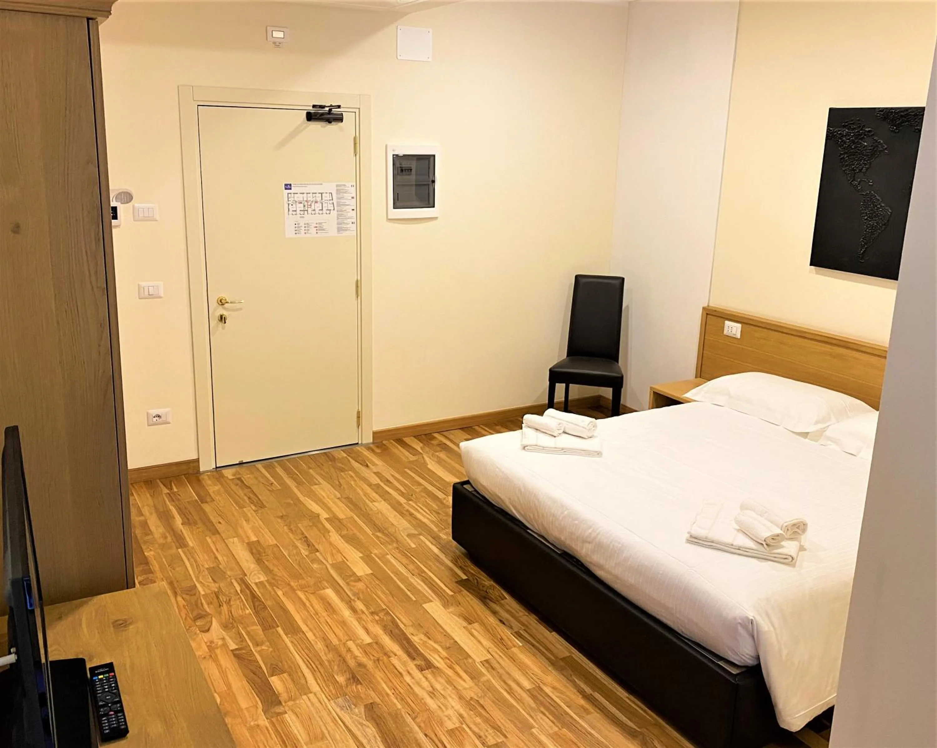 Bed in Hotel Trieste