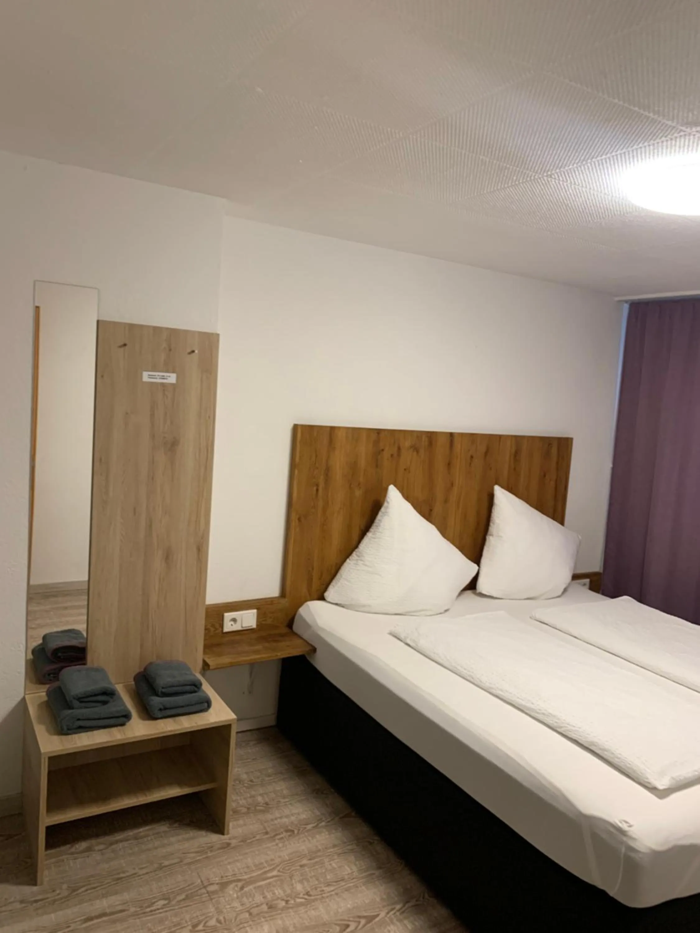 Bed in Smart Stay Rooms Feldkirch