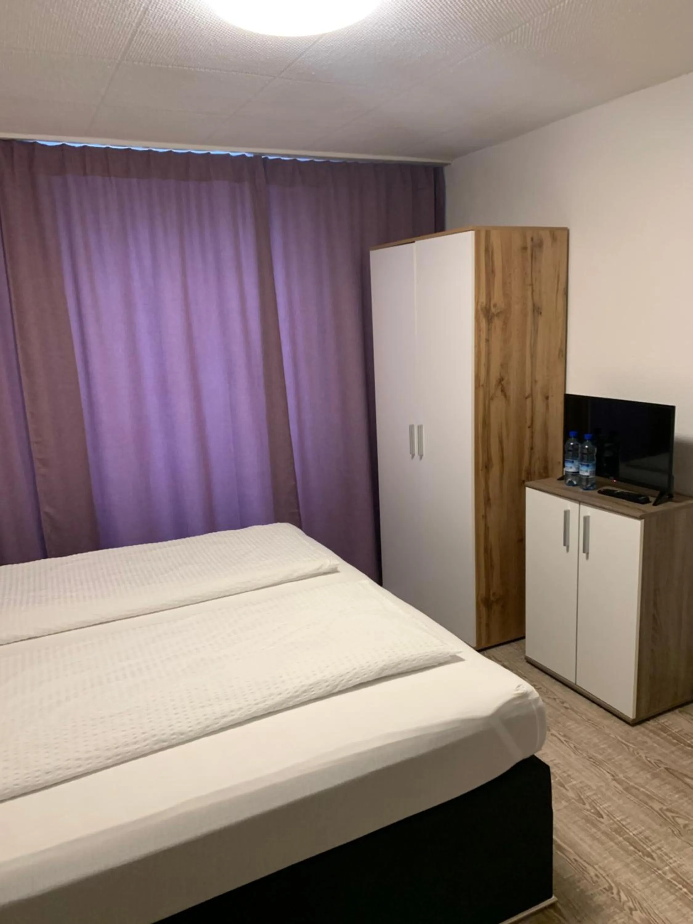 Bed in Smart Stay Rooms Feldkirch