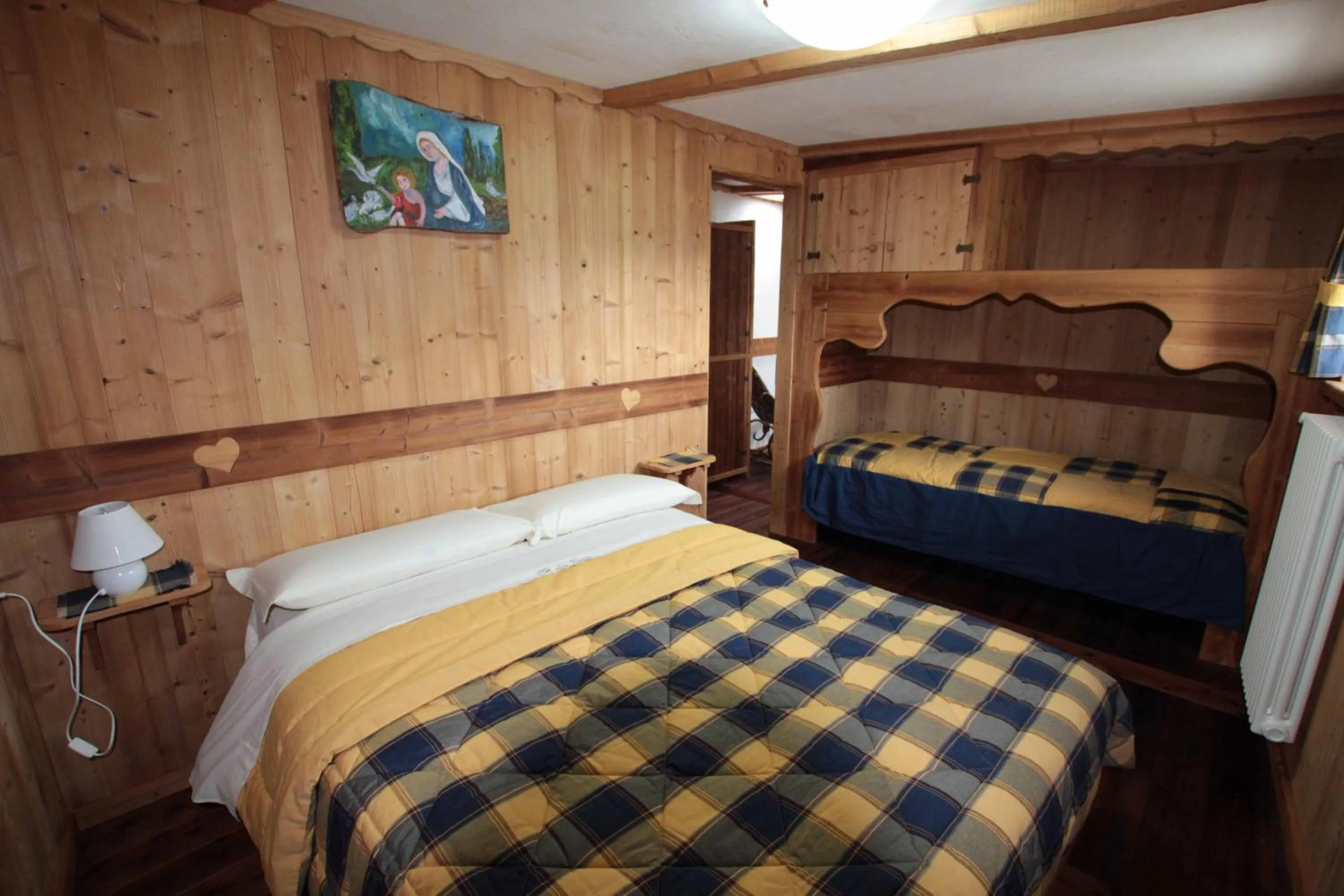 Bed in Chambres D'Hotes Les Fleurs