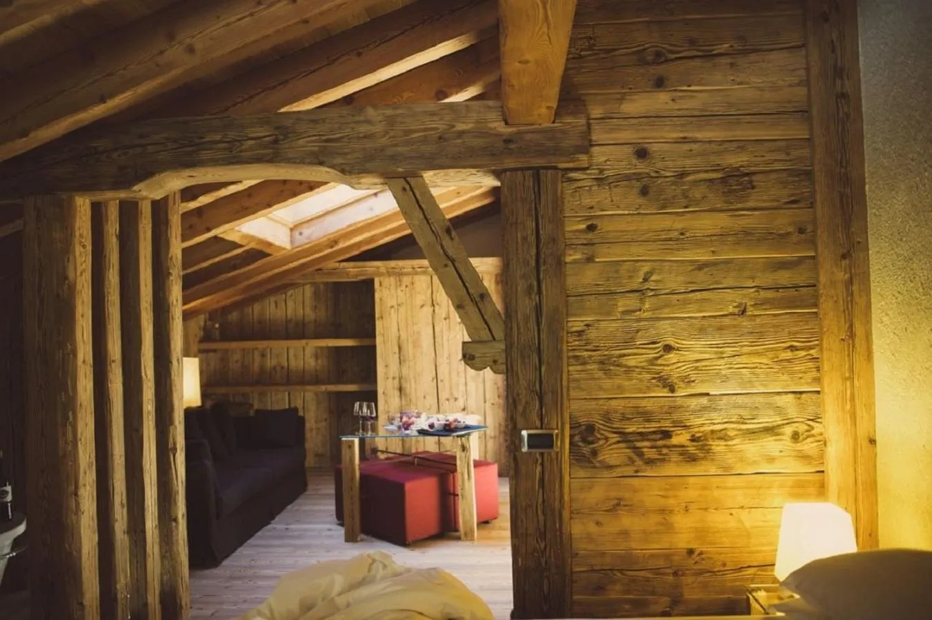Communal lounge/ TV room, Bed in Alpen Hotel Chalet