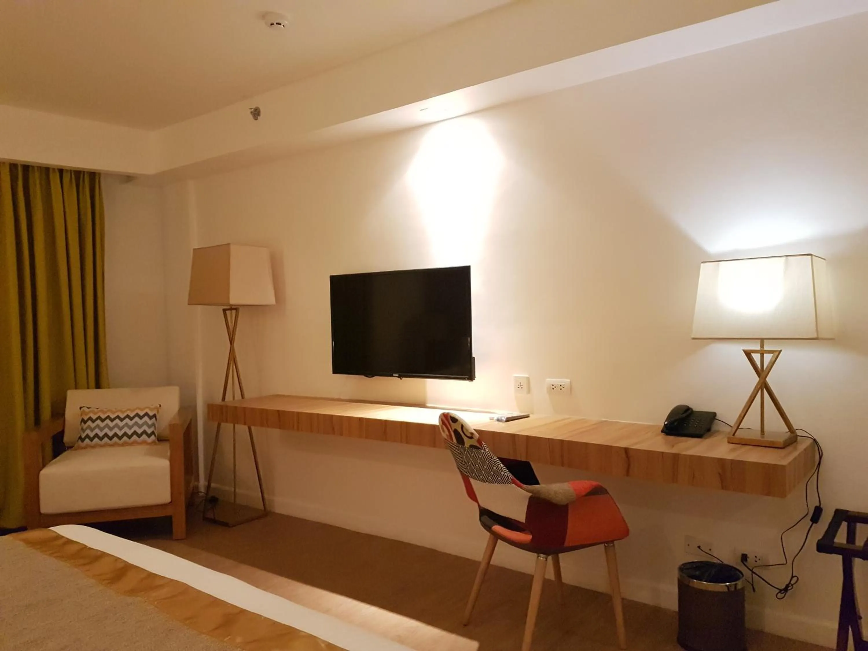 Seating area, Bed in Ferra Hotel and Garden Suites