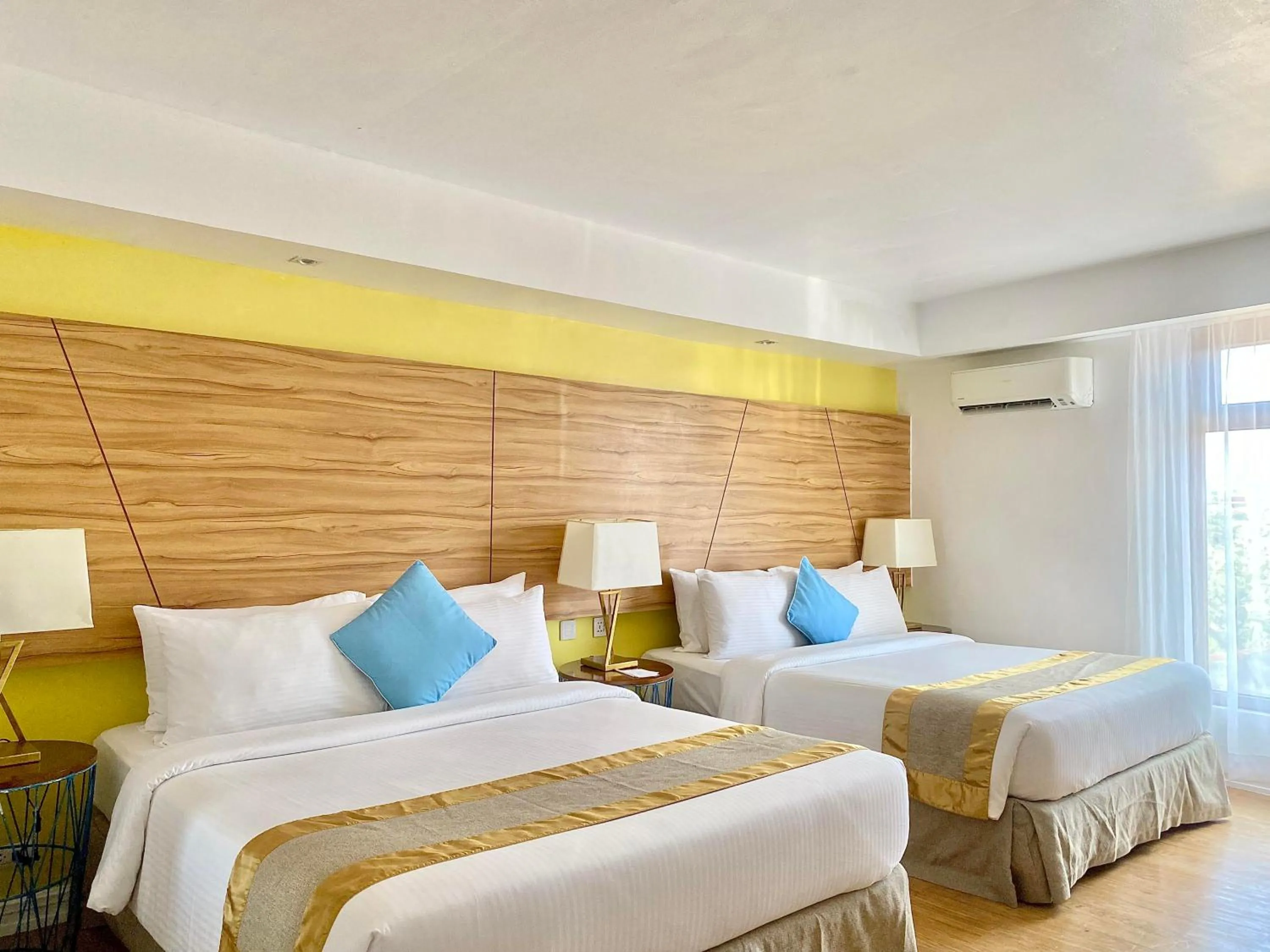 Bed in Ferra Hotel and Garden Suites