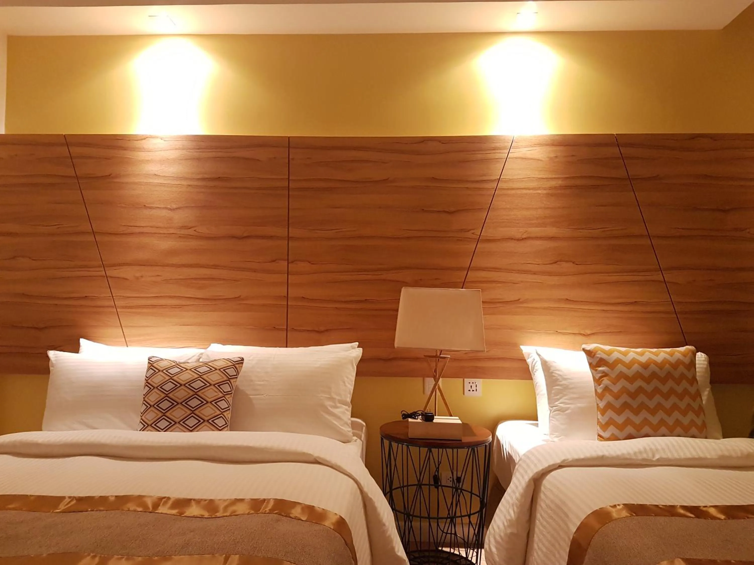 Bed in Ferra Hotel and Garden Suites