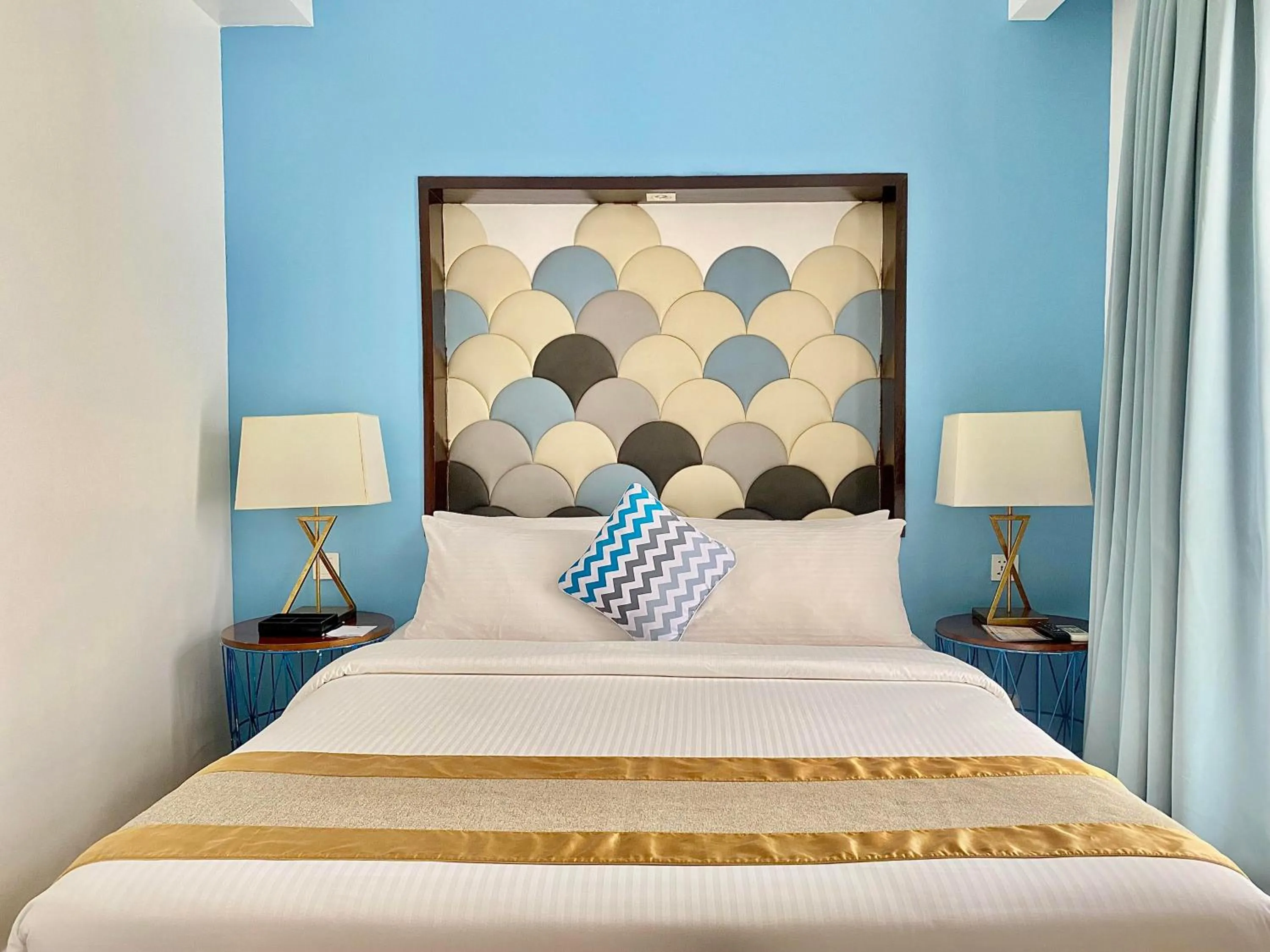 Bed in Ferra Hotel and Garden Suites