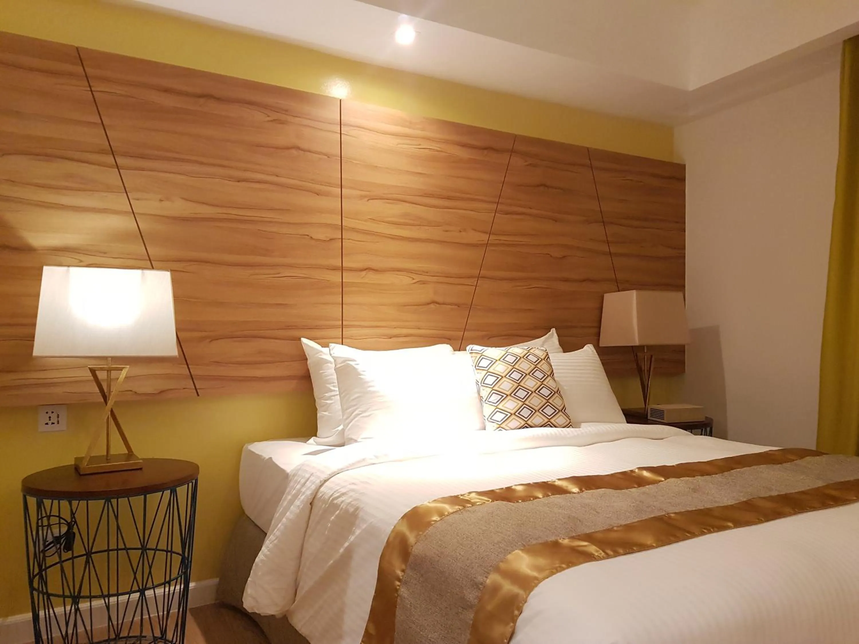 Bed in Ferra Hotel and Garden Suites