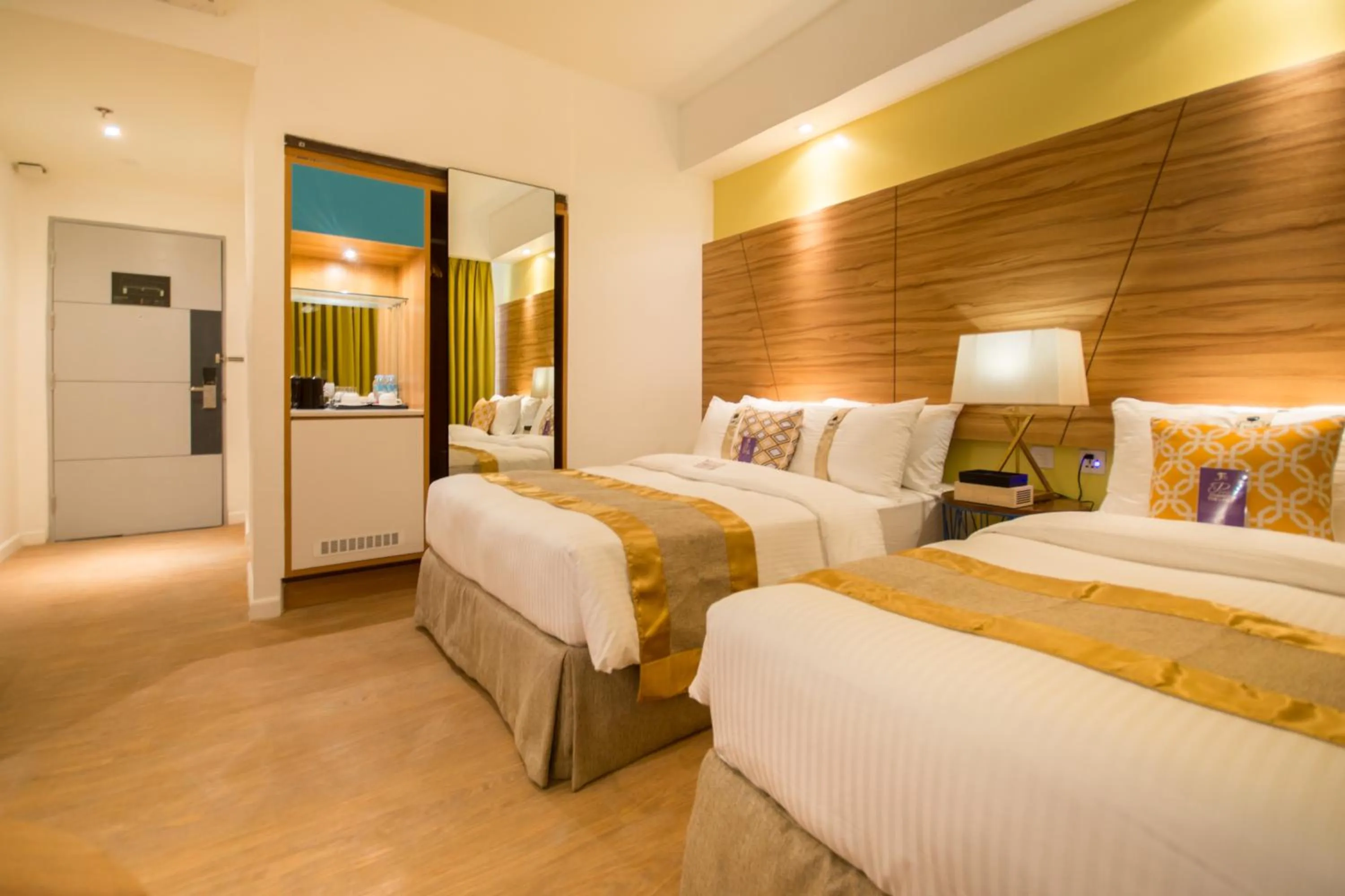 Bed in Ferra Hotel and Garden Suites