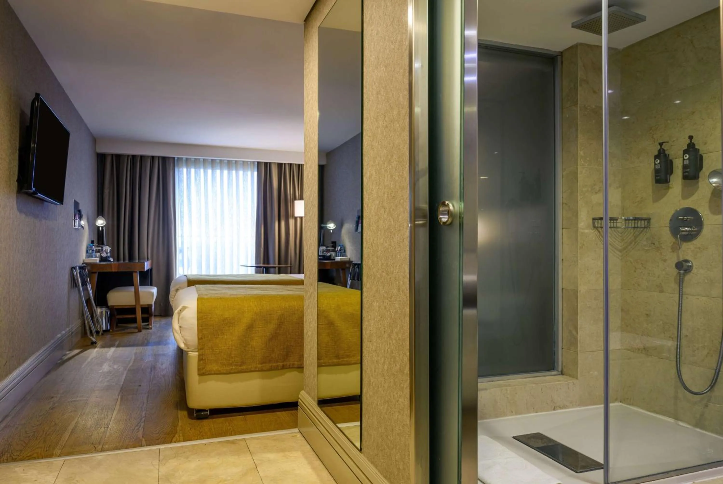 Photo of the whole room in Ramada by Wyndham Istanbul Grand Bazaar