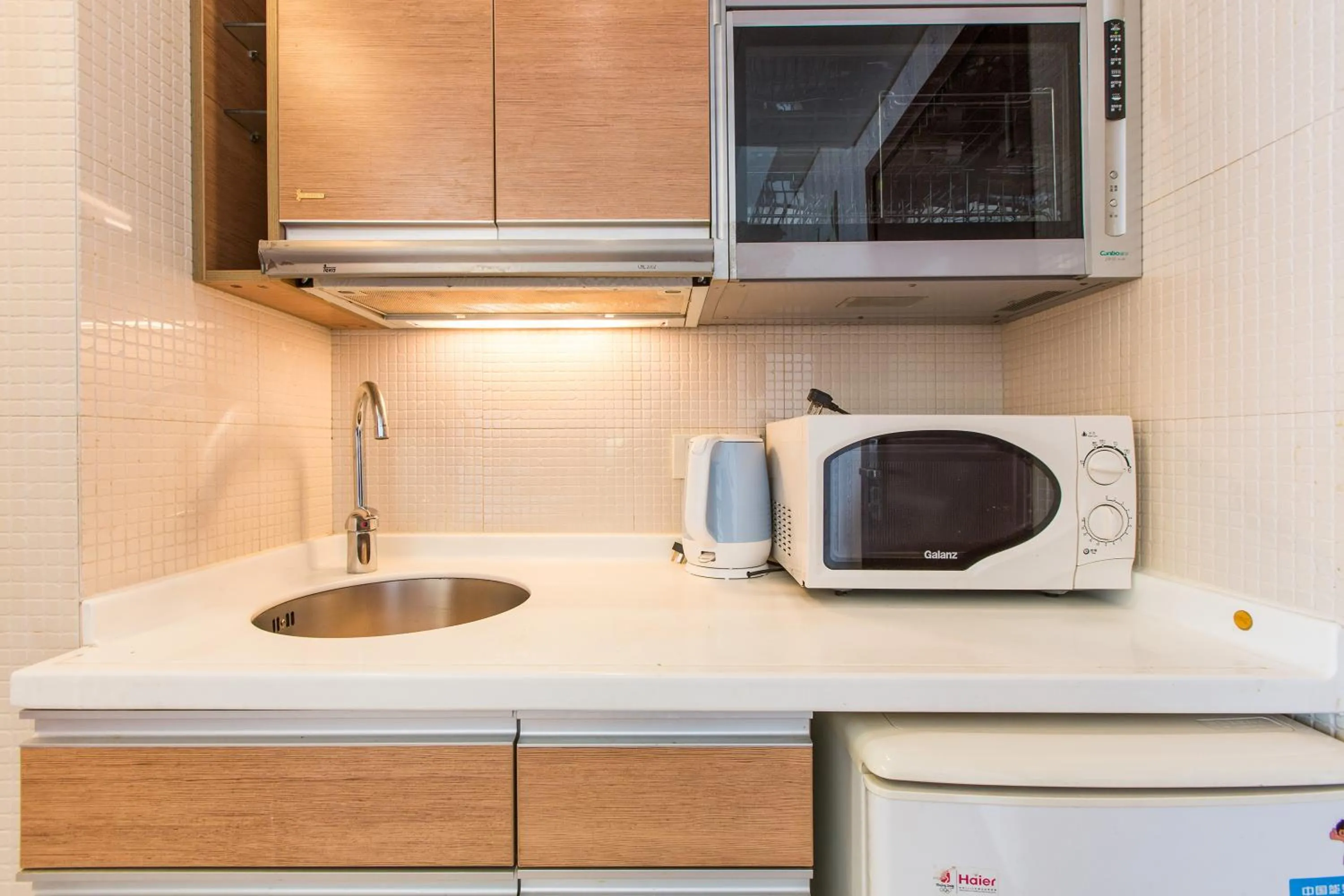 Kitchen or kitchenette in Westlake Service Apartment