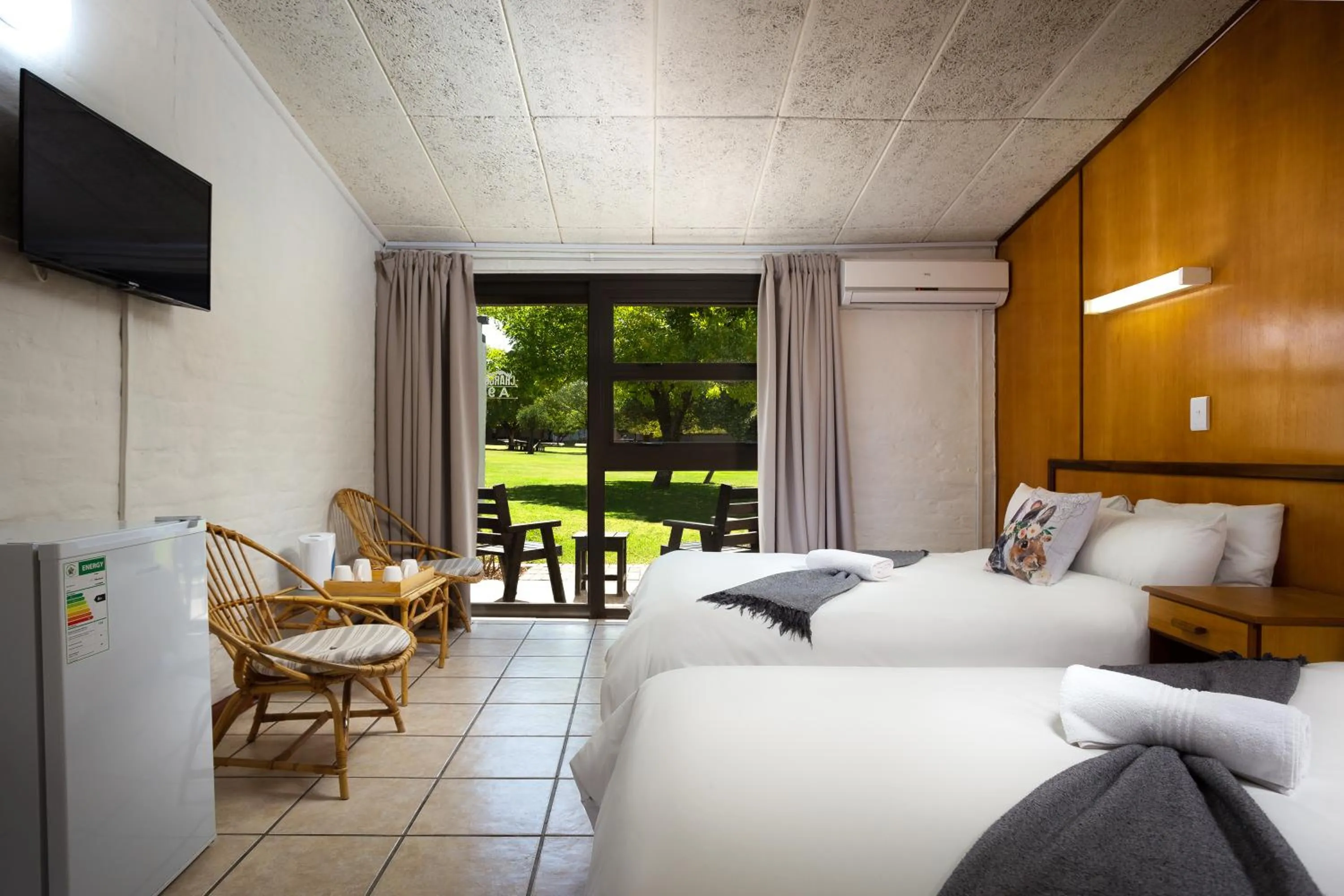 Bed in Merino Inn Hotel