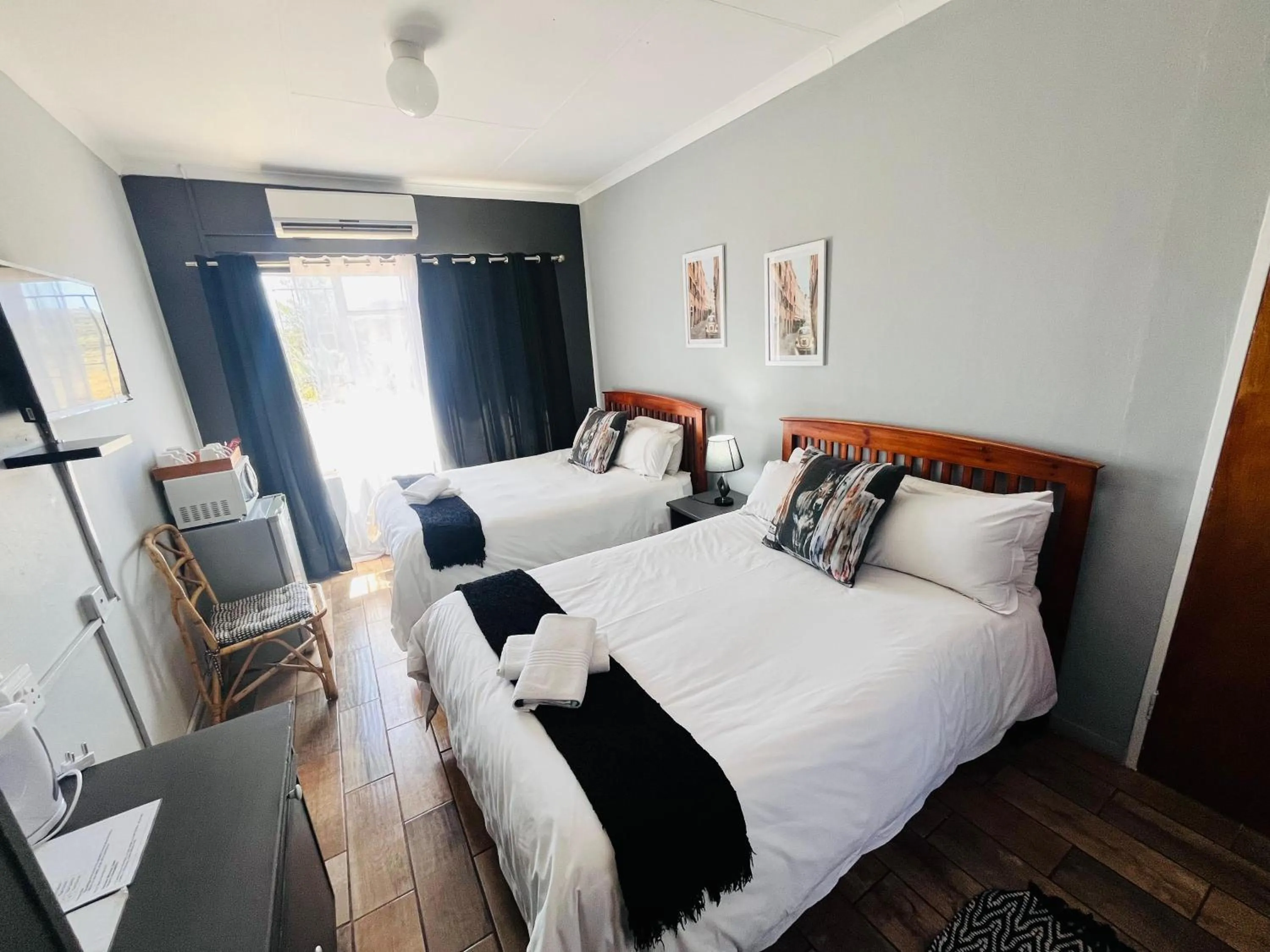 Bed in Merino Inn Hotel