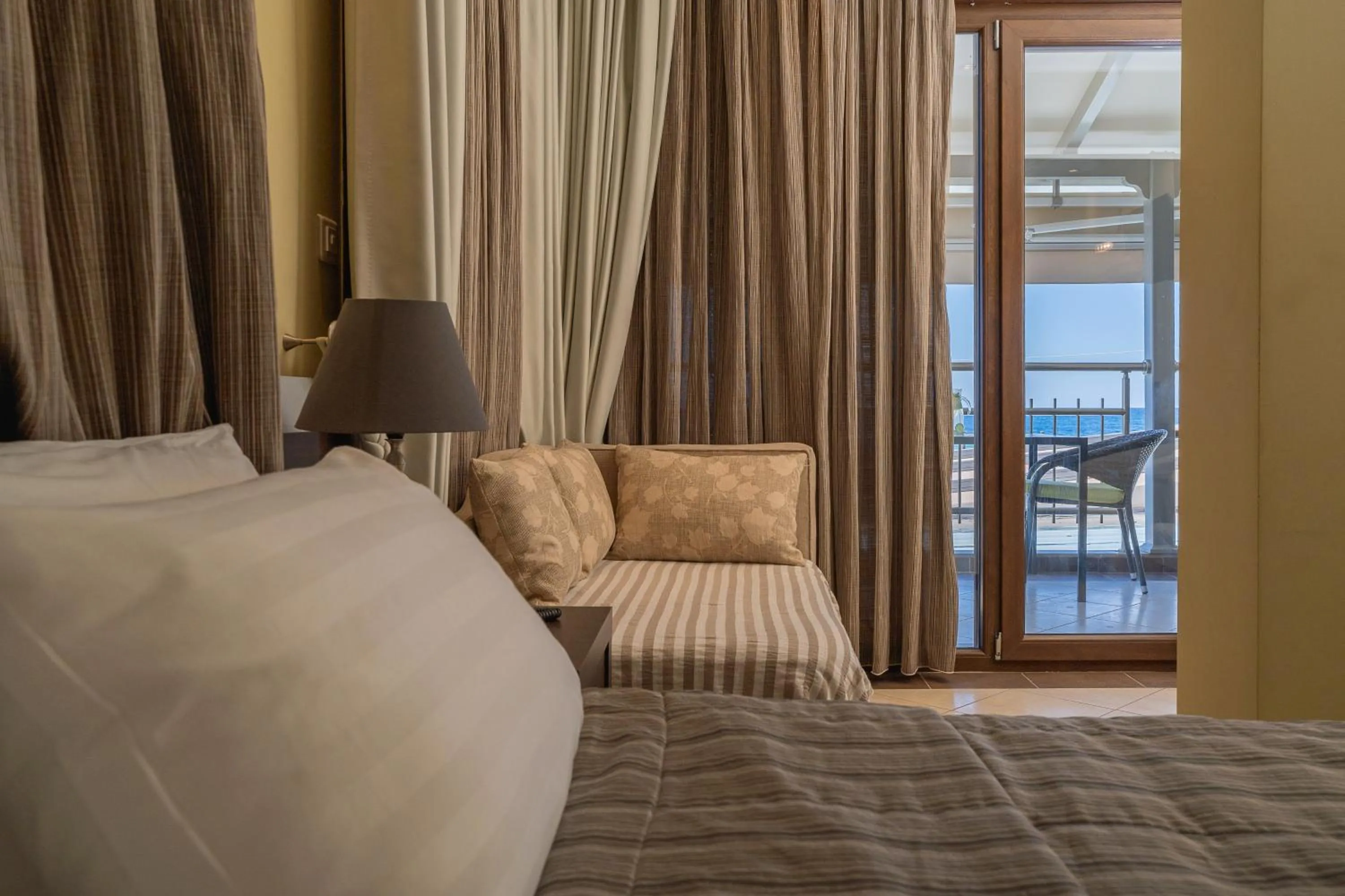 Bed in Meliton Inn Hotel & Suites by the beach