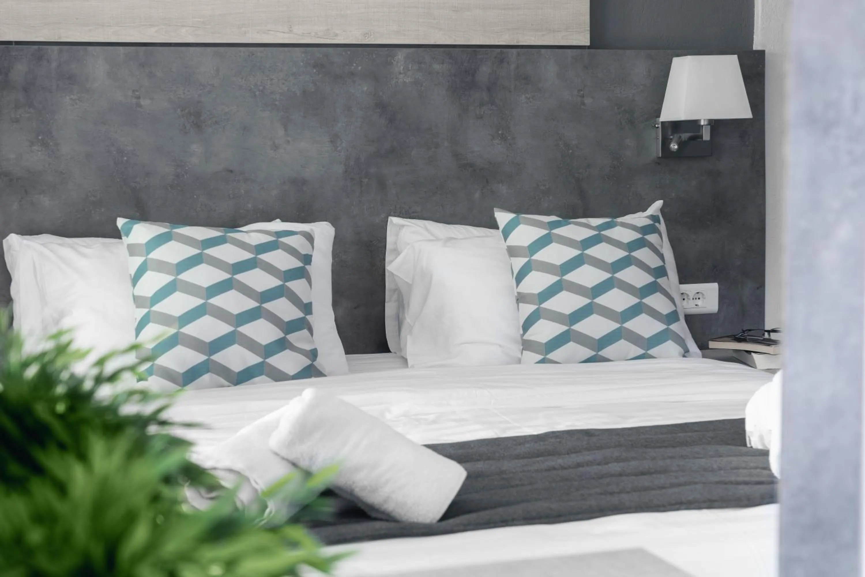 Bed in Meliton Inn Hotel & Suites by the beach