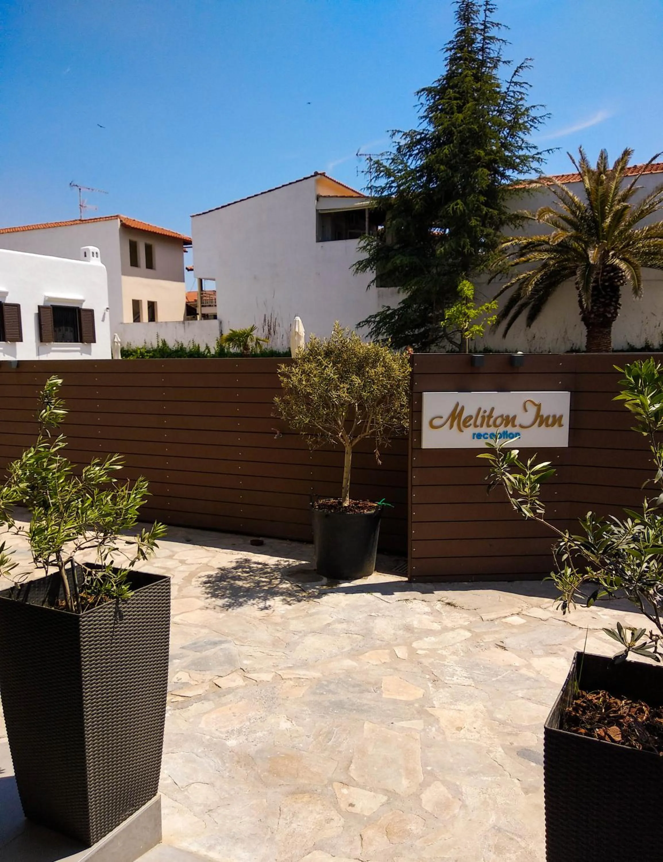 Patio in Meliton Inn Hotel & Suites by the beach