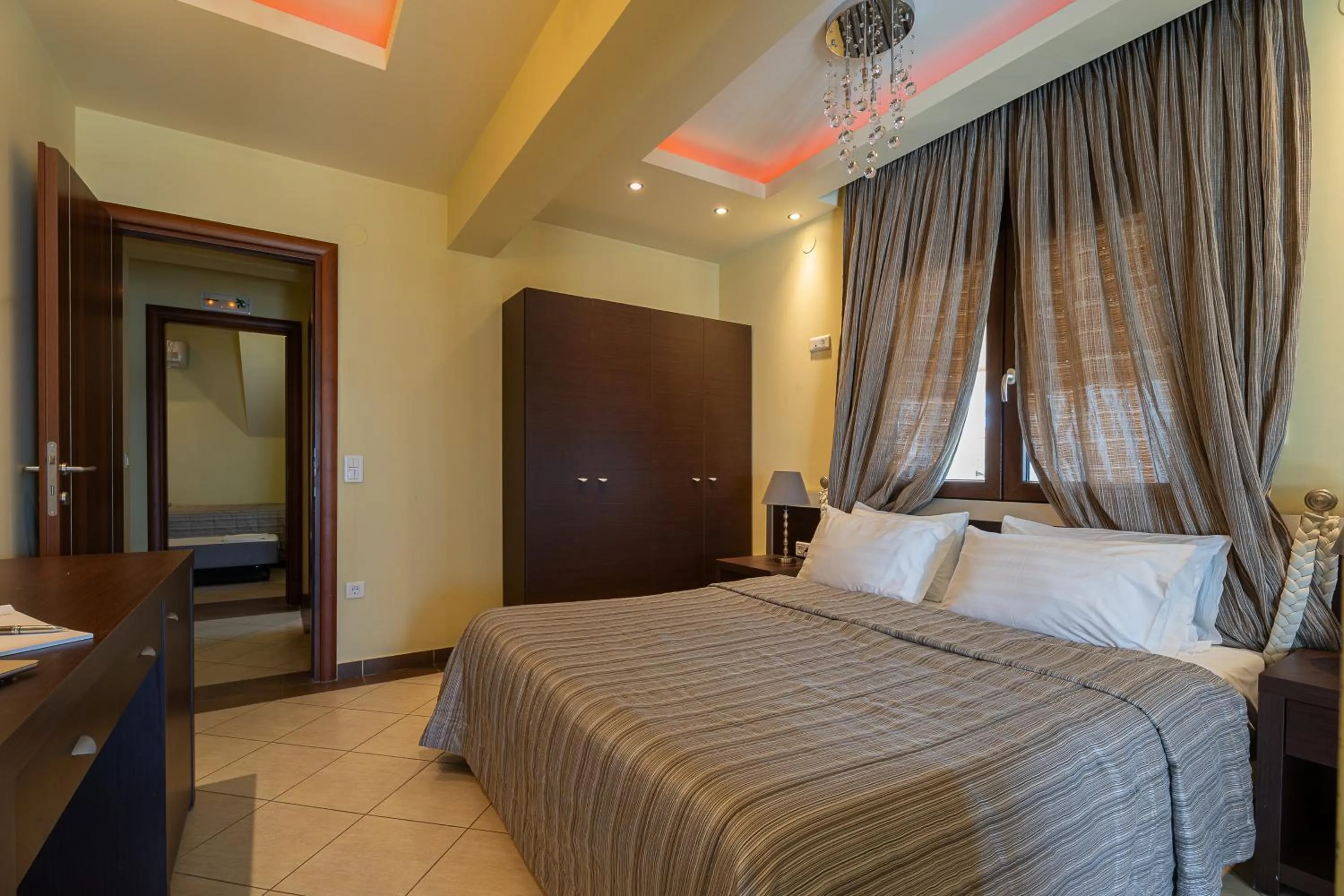 Bed in Meliton Inn Hotel & Suites by the beach