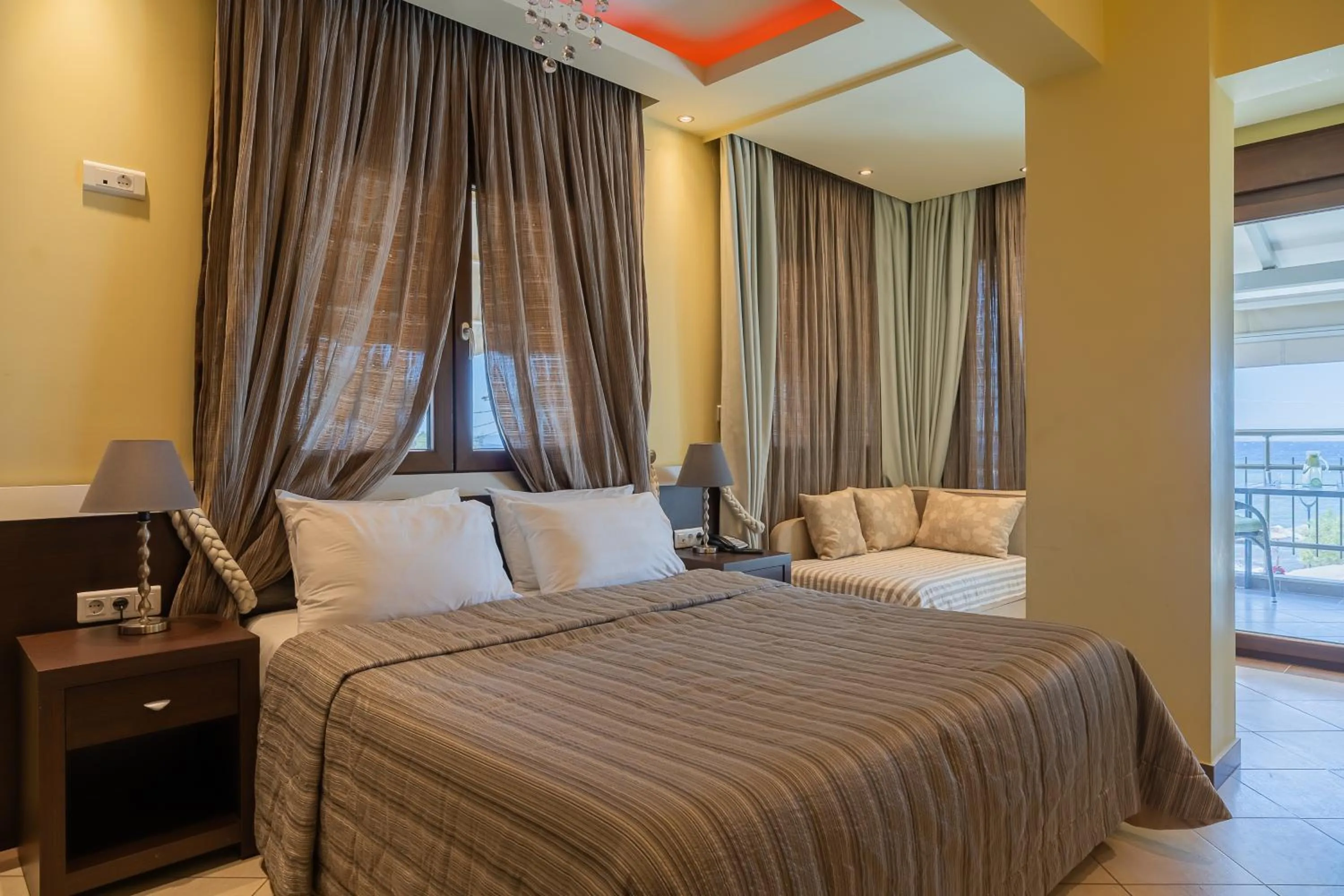 Bed in Meliton Inn Hotel & Suites by the beach