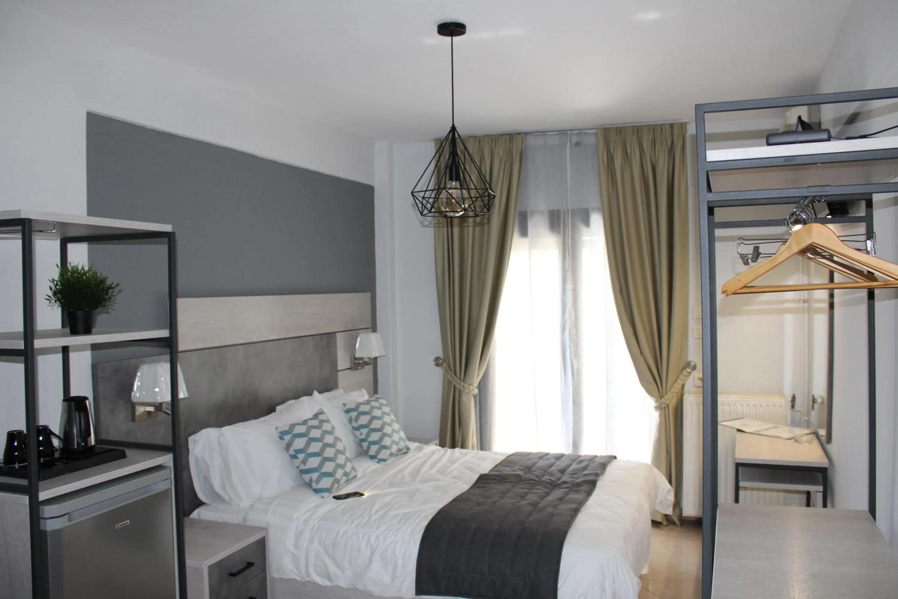 Bed in Meliton Inn Hotel & Suites by the beach