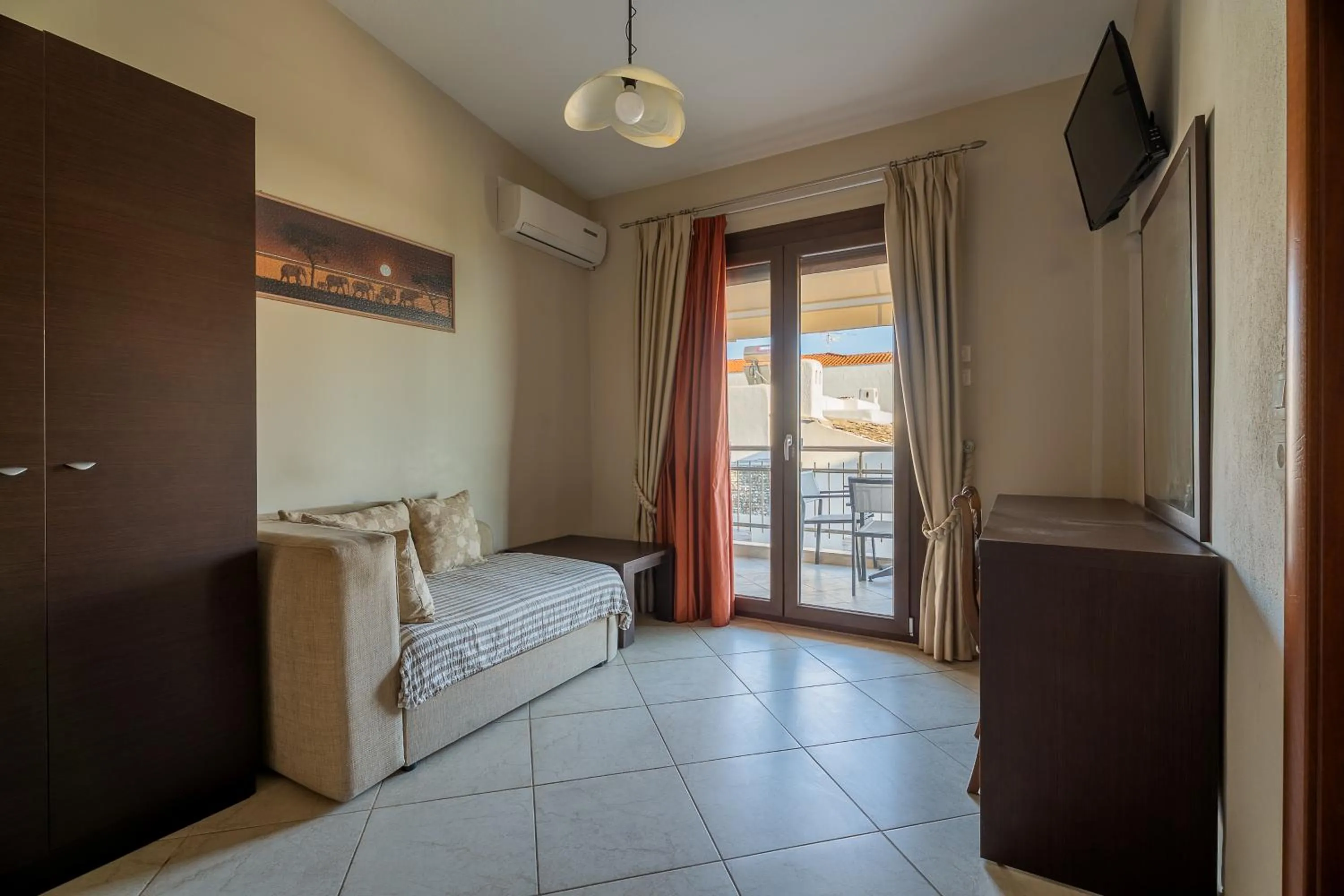 Bed in Meliton Inn Hotel & Suites by the beach