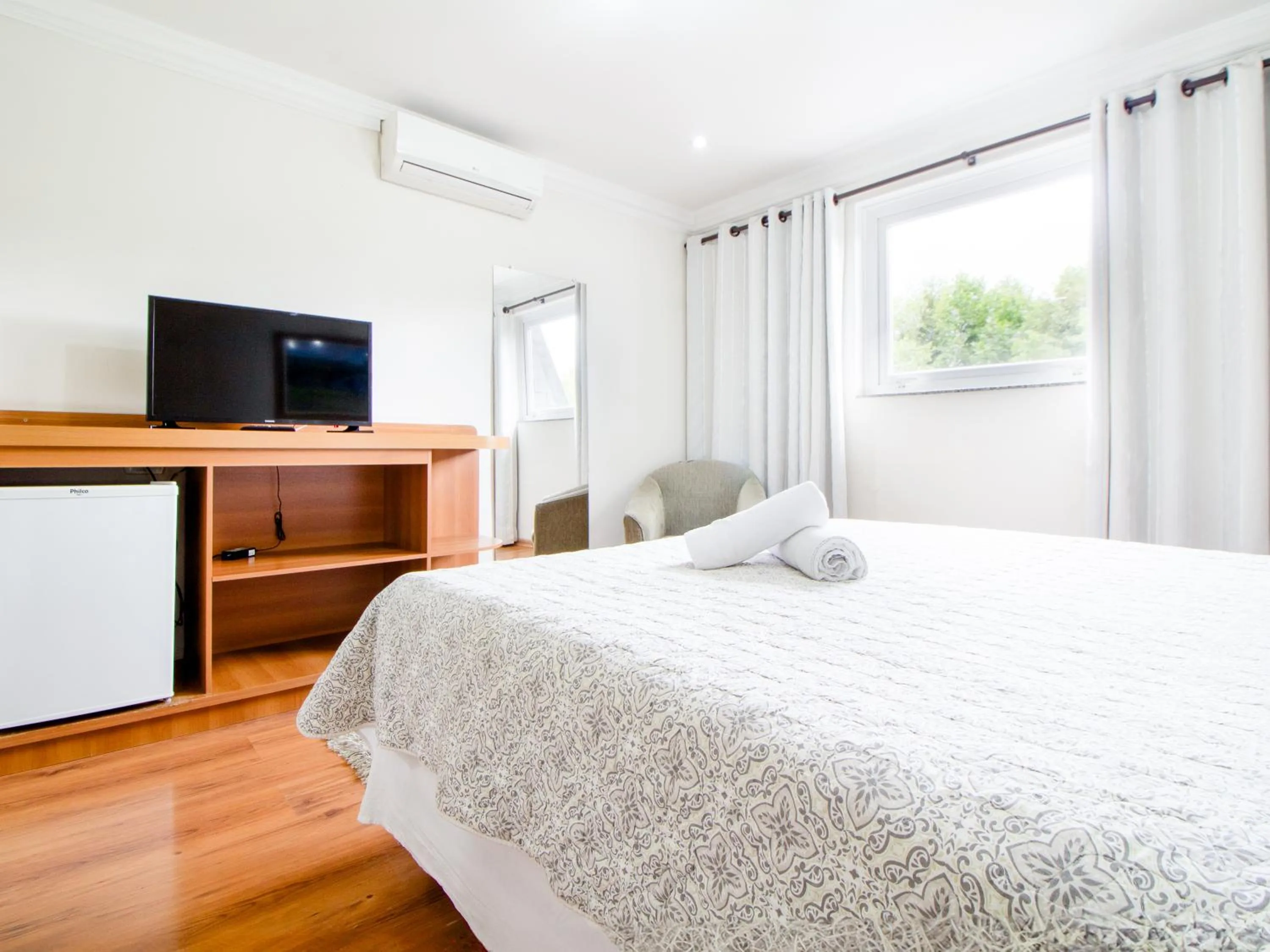 Bed in VELINN Pousada Chateau do Luar