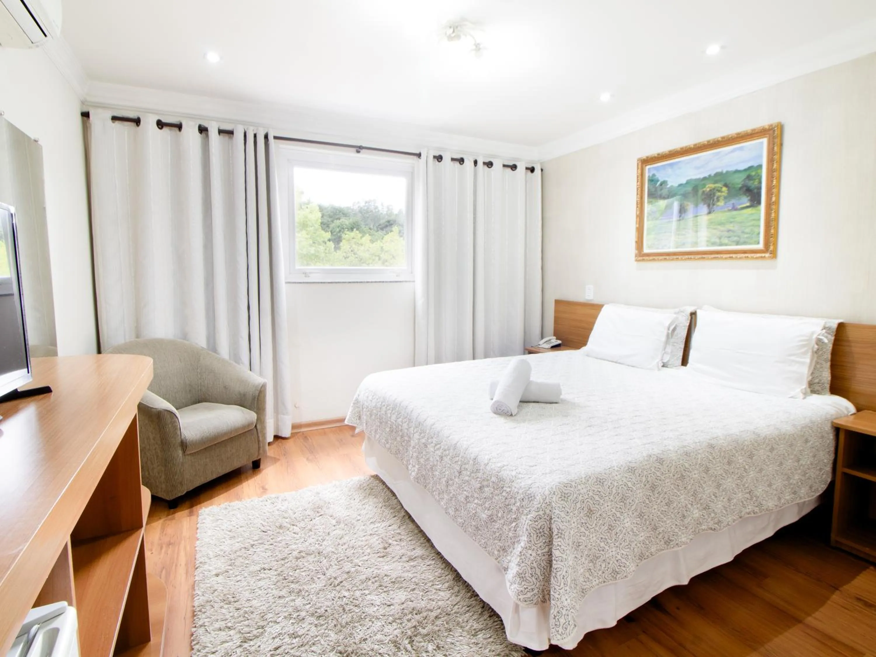 Bed in VELINN Pousada Chateau do Luar