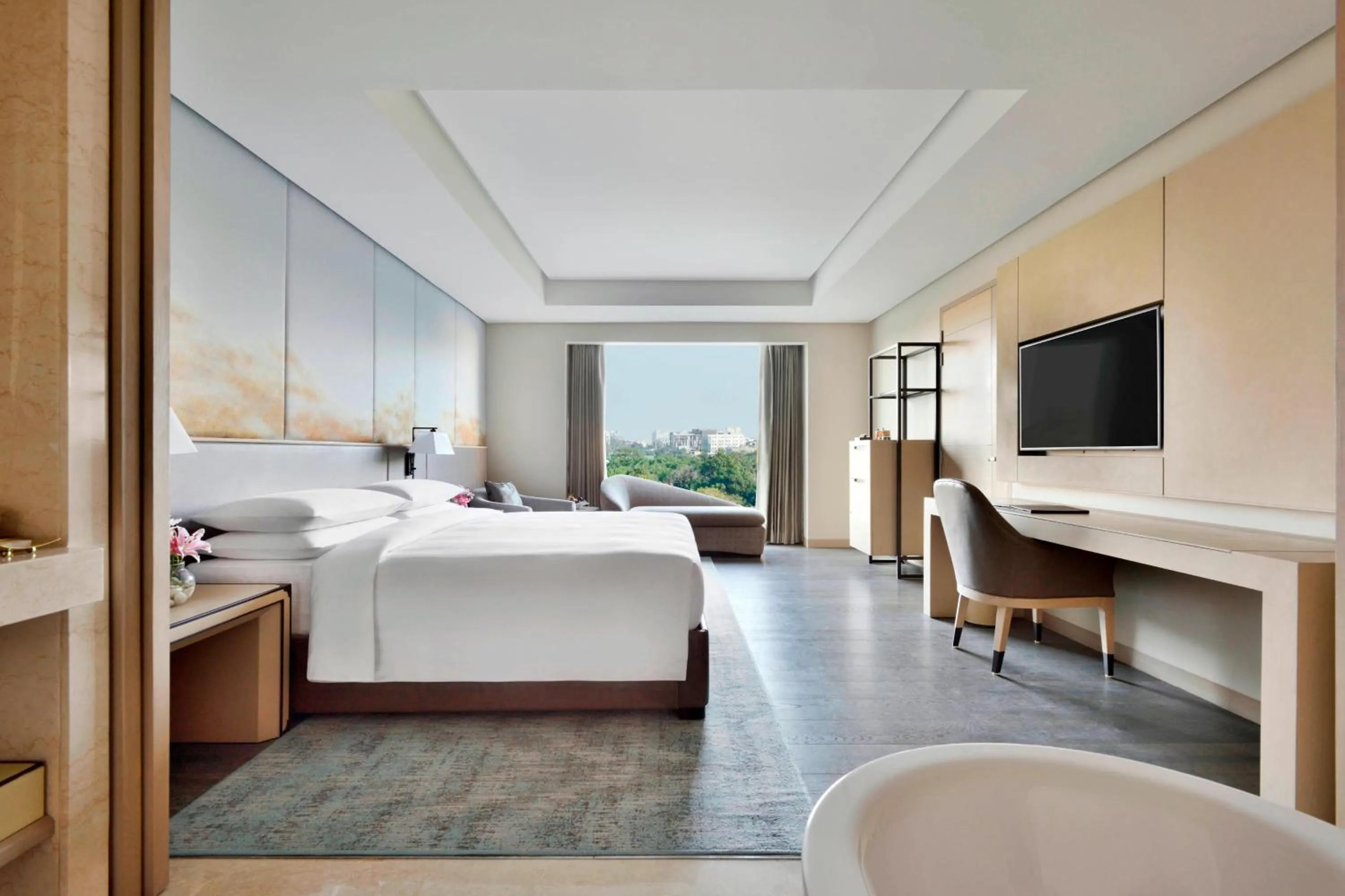 Photo of the whole room, Bed in Indore Marriott Hotel