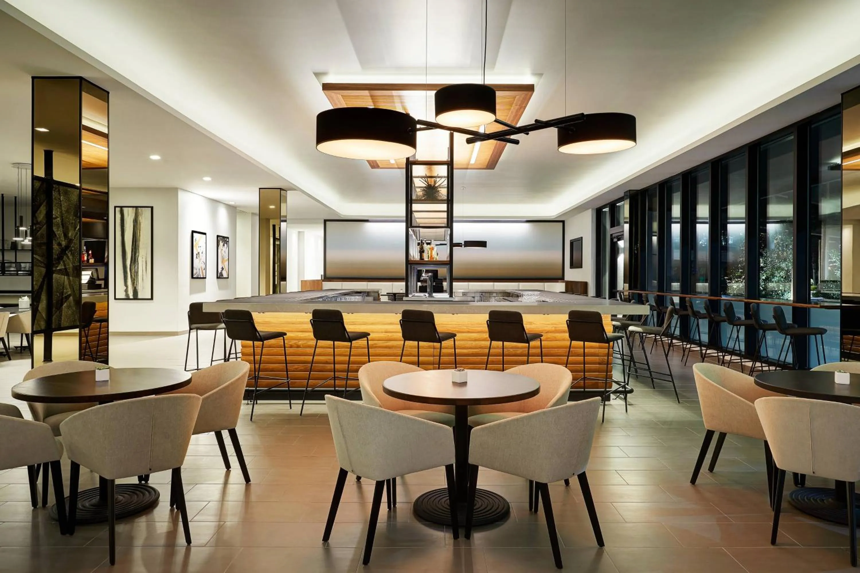 Lounge or bar in AC Hotel by Marriott Tampa Airport