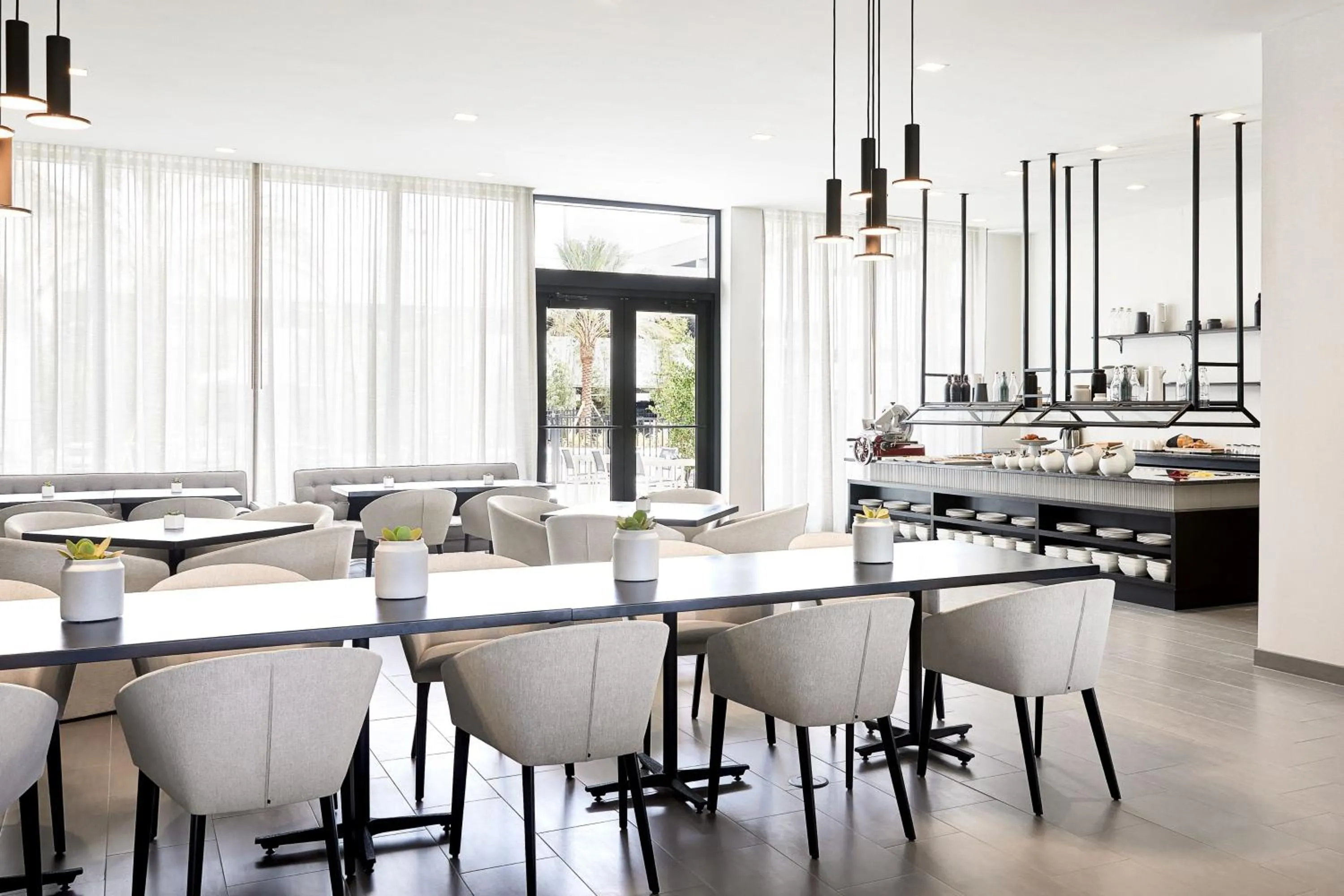 Kitchen or kitchenette in AC Hotel by Marriott Tampa Airport