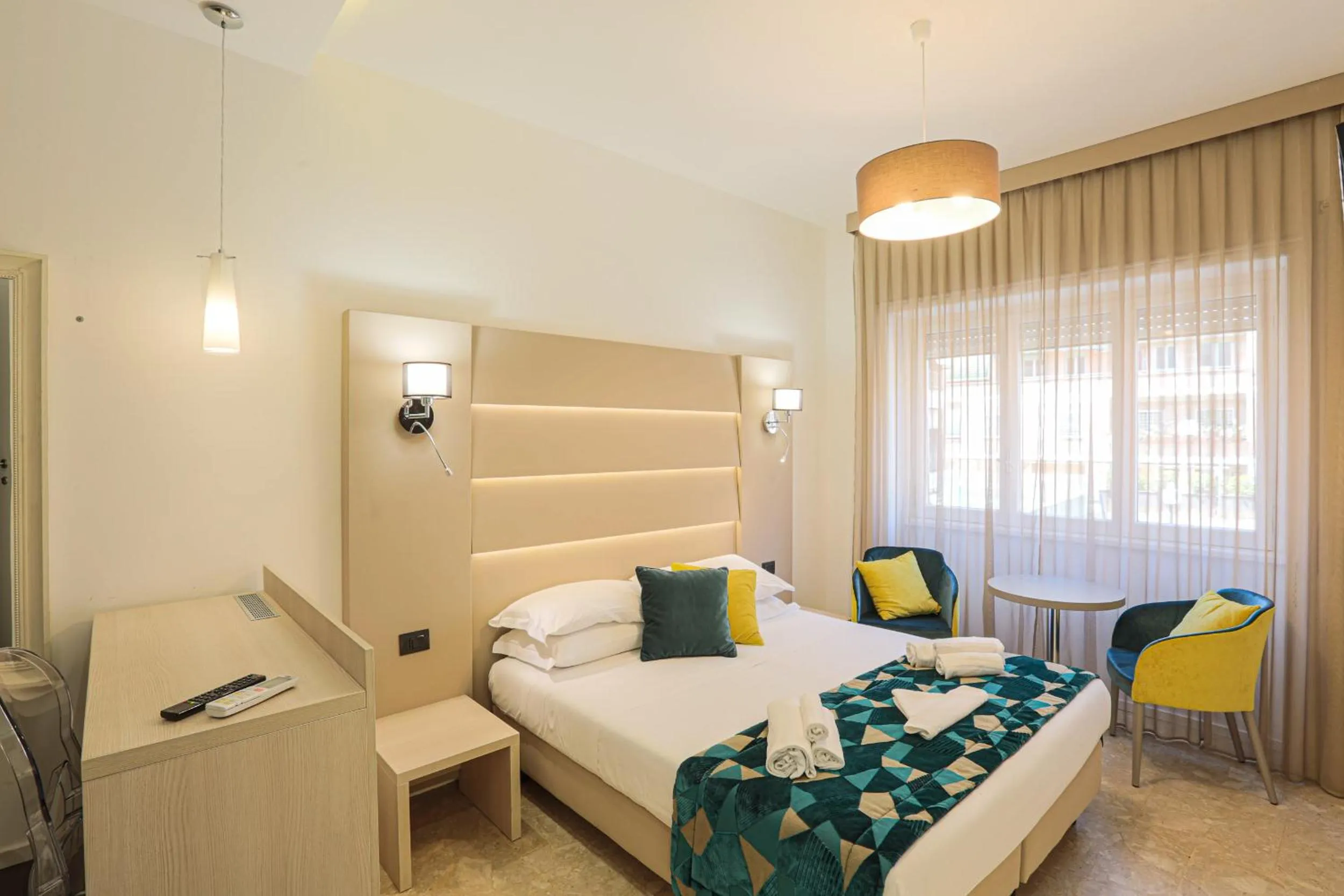 Bed in DaVinci Relais Guest House