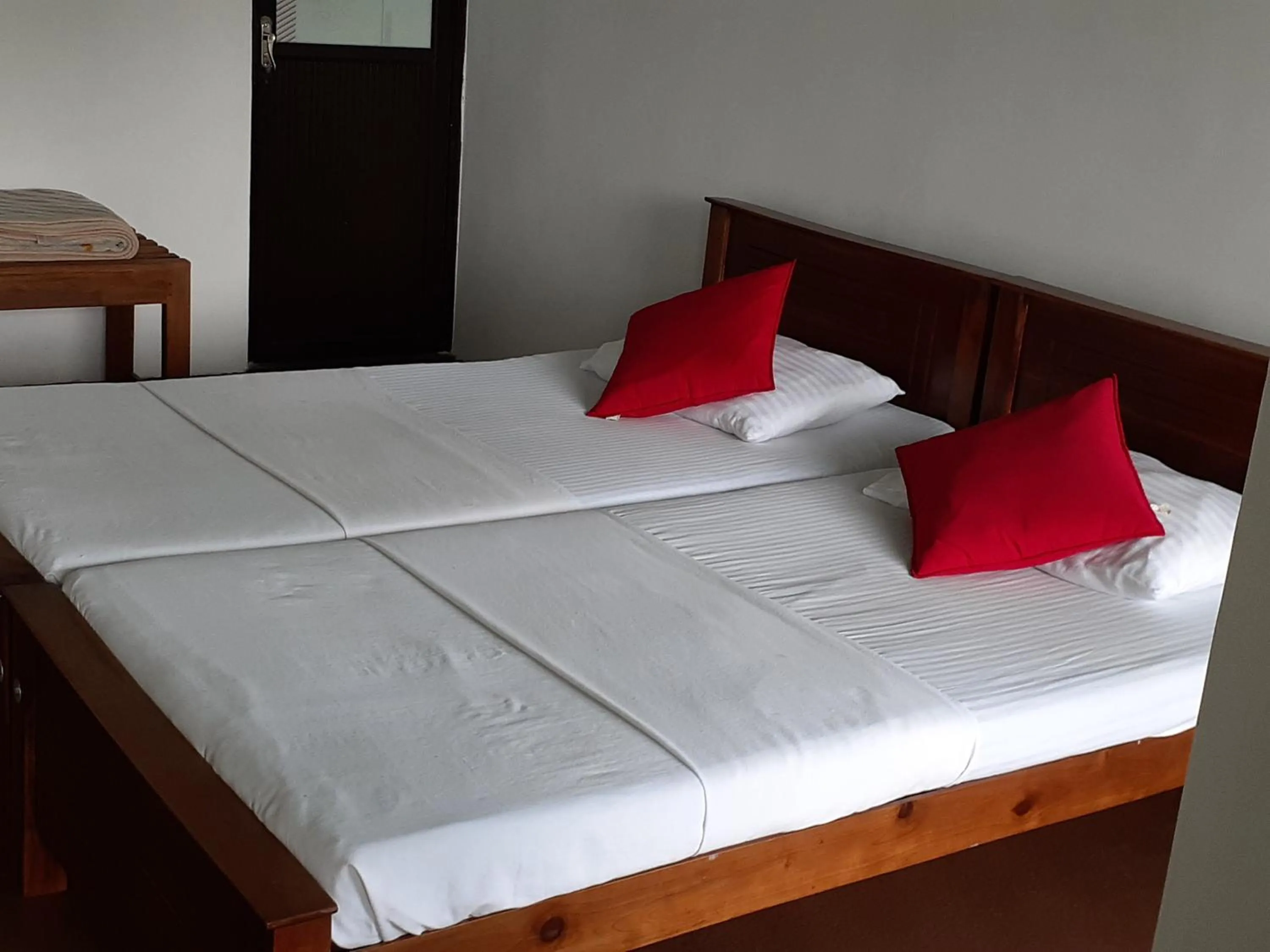 Bed in Kandy Mountain Cottage