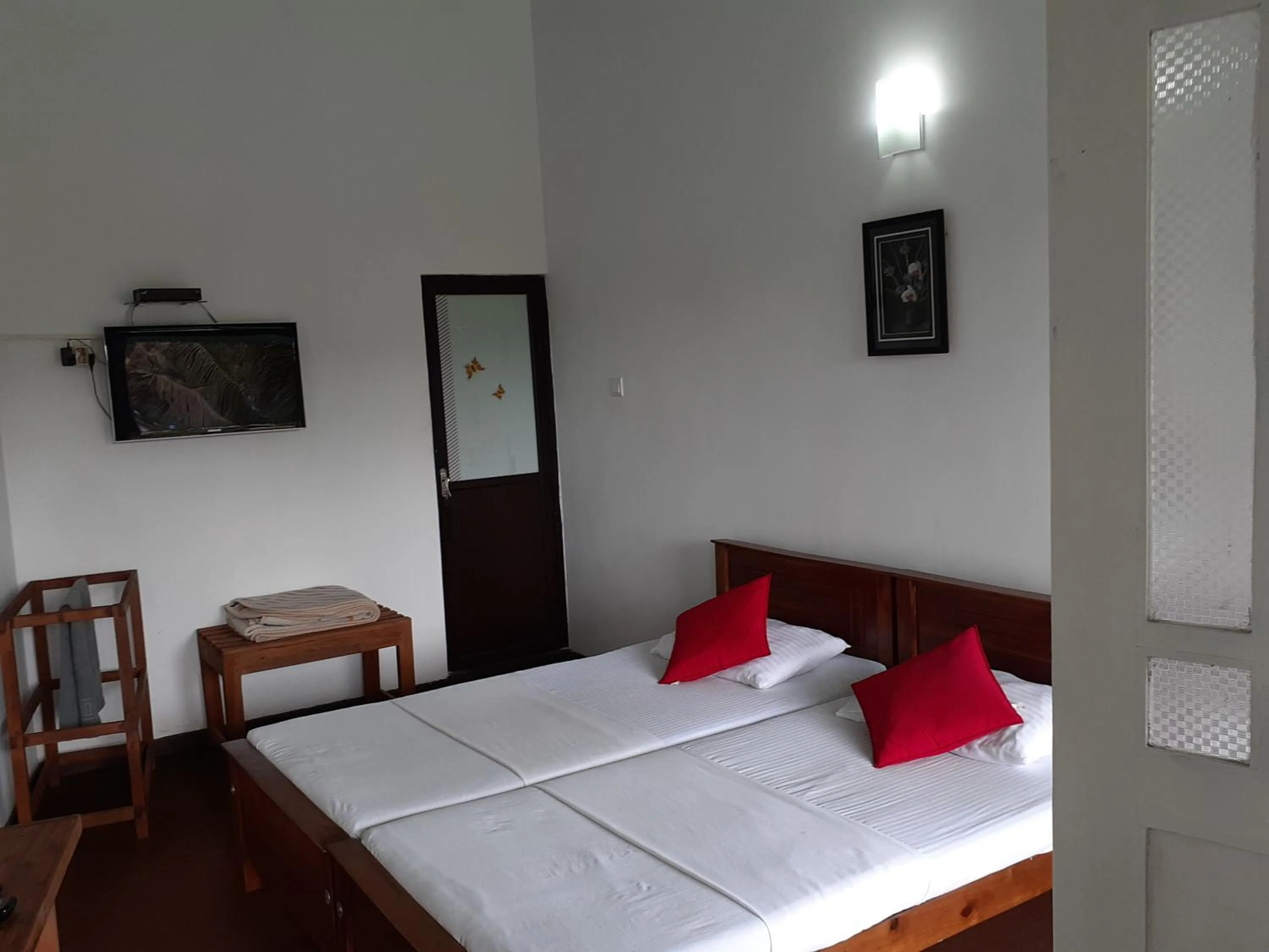 Bed in Kandy Mountain Cottage