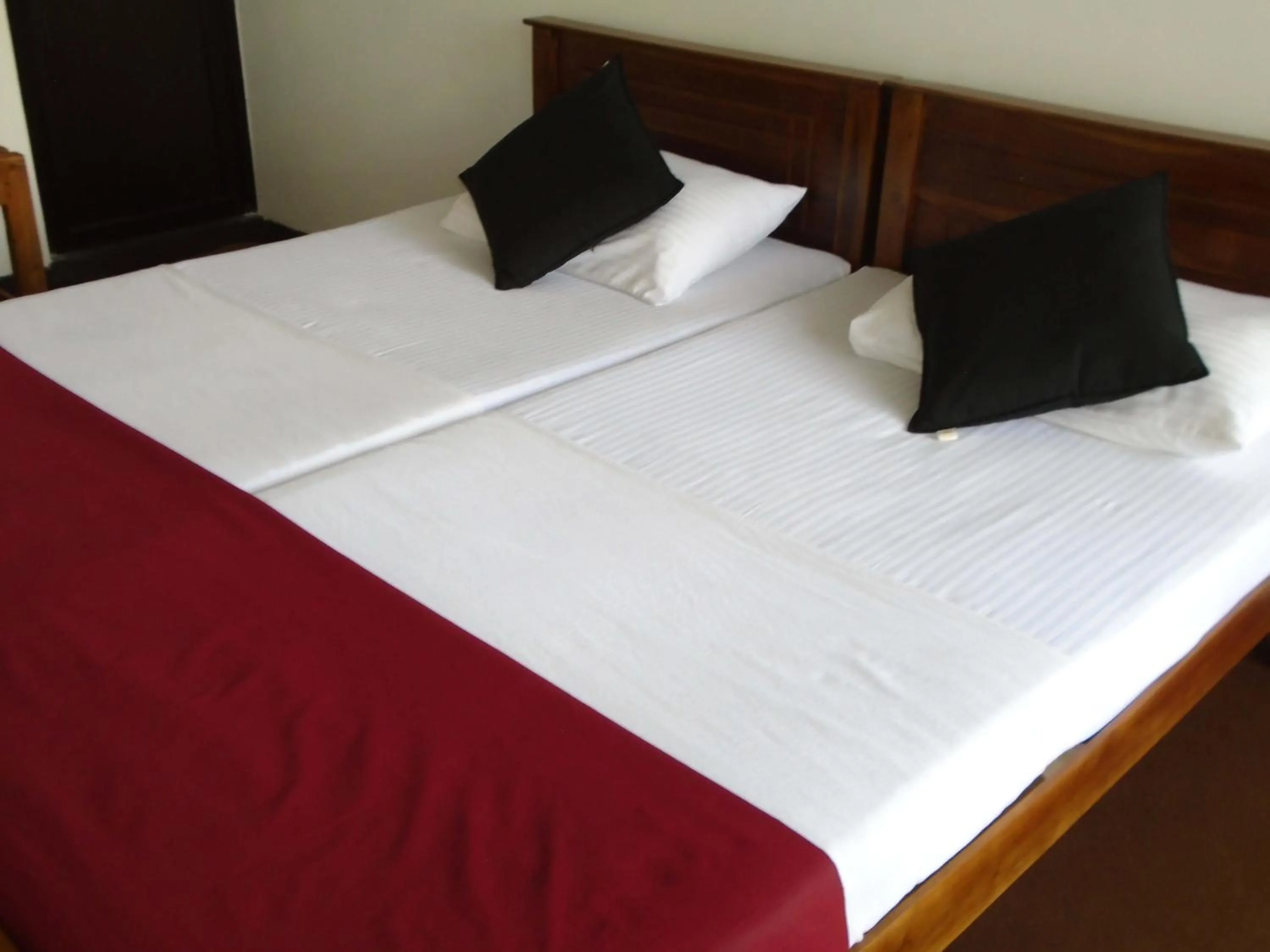 Bed in Kandy Mountain Cottage