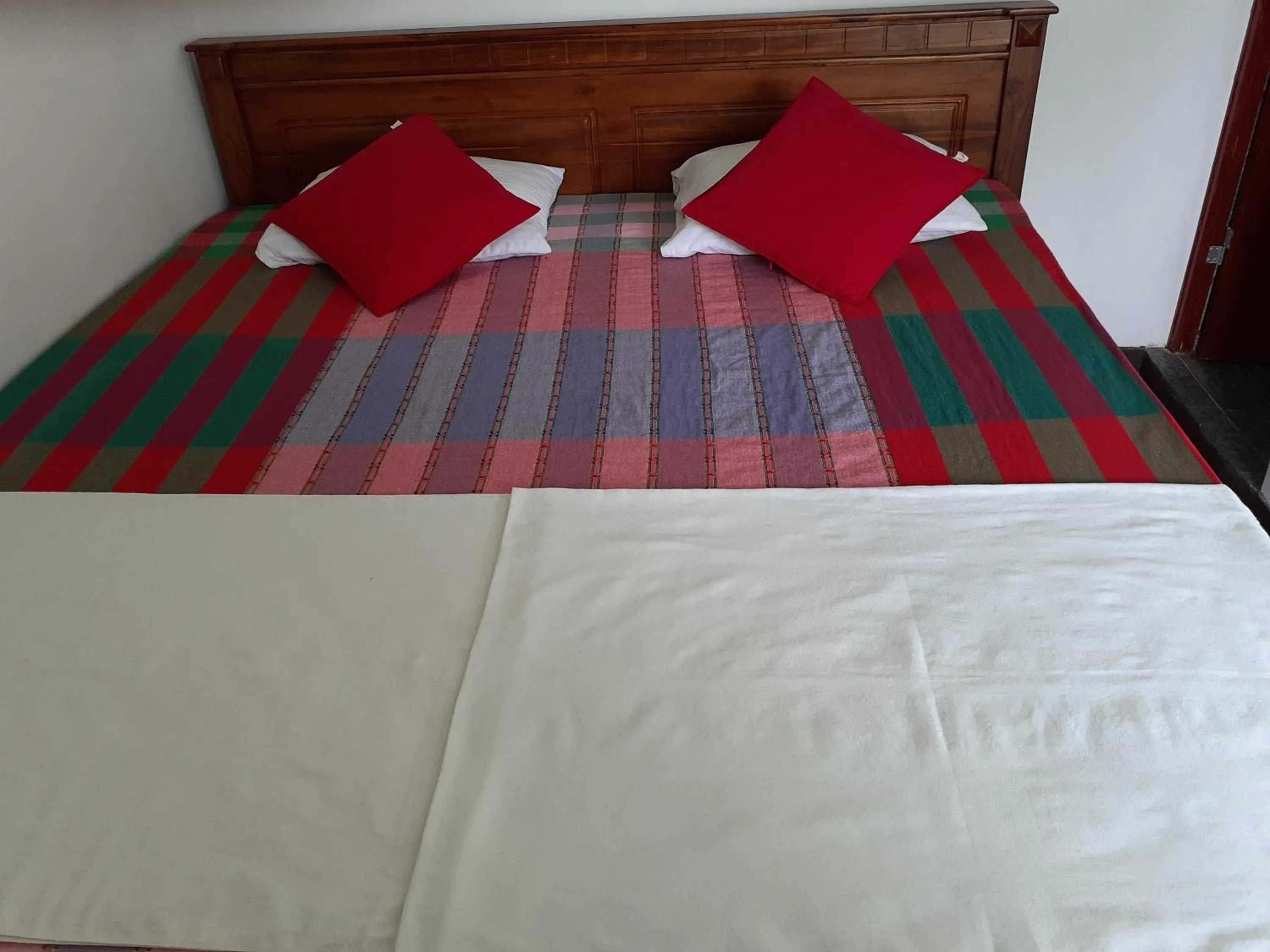 Bed in Kandy Mountain Cottage