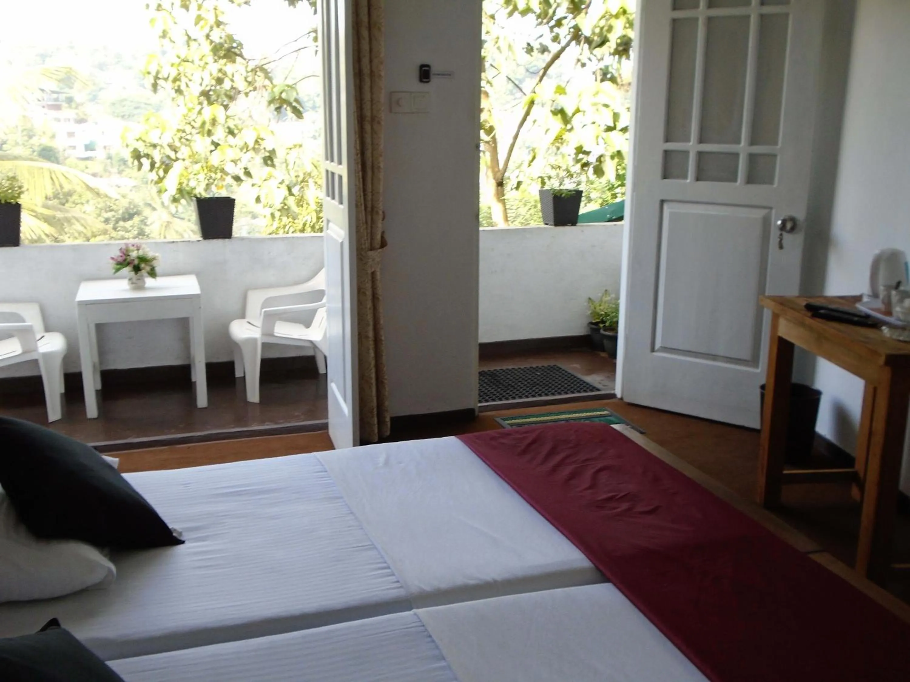 Bed in Kandy Mountain Cottage
