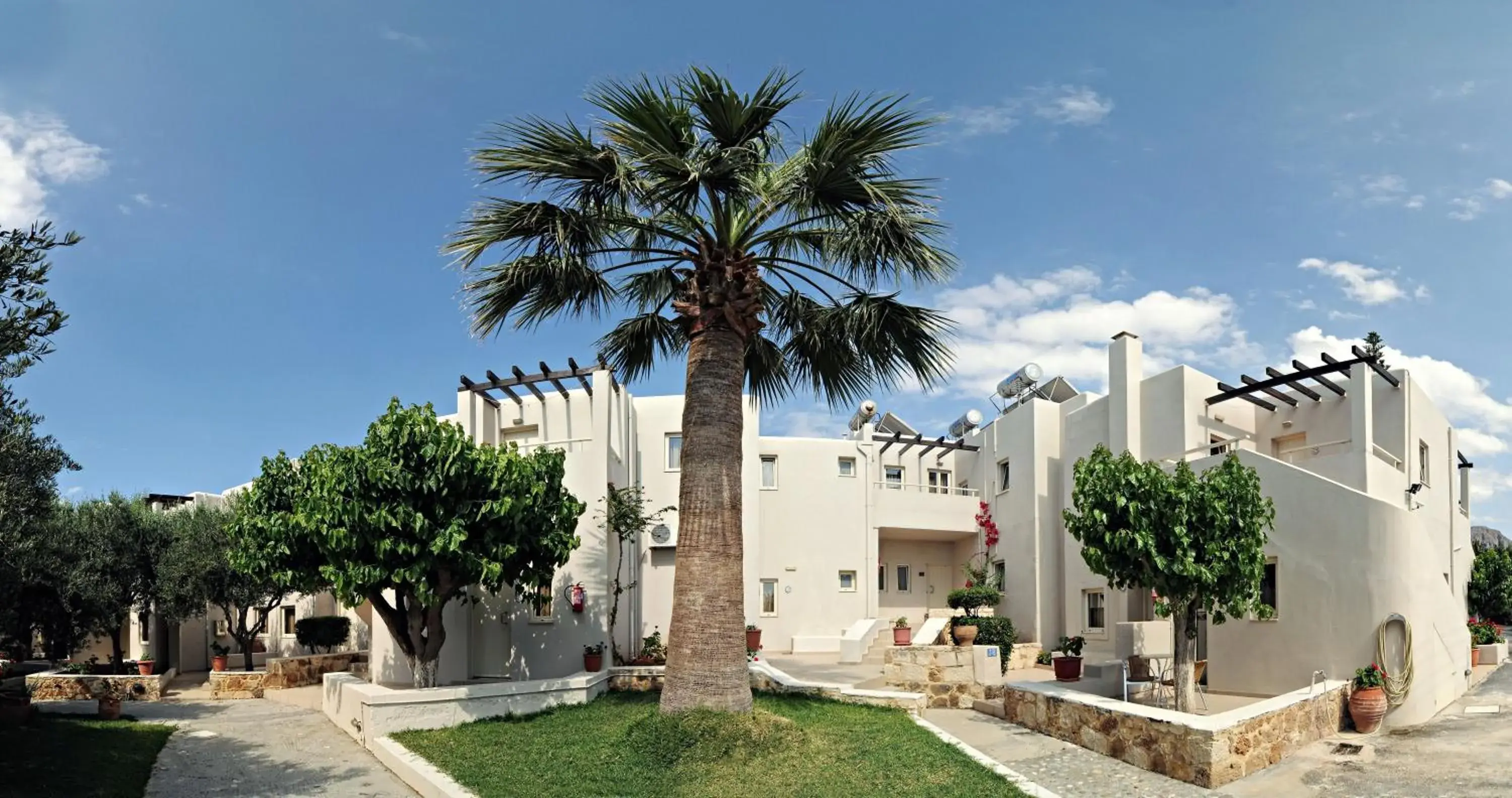 Property building in Ourania Apartments Hotel Property building in Ourania Apartments Hotel