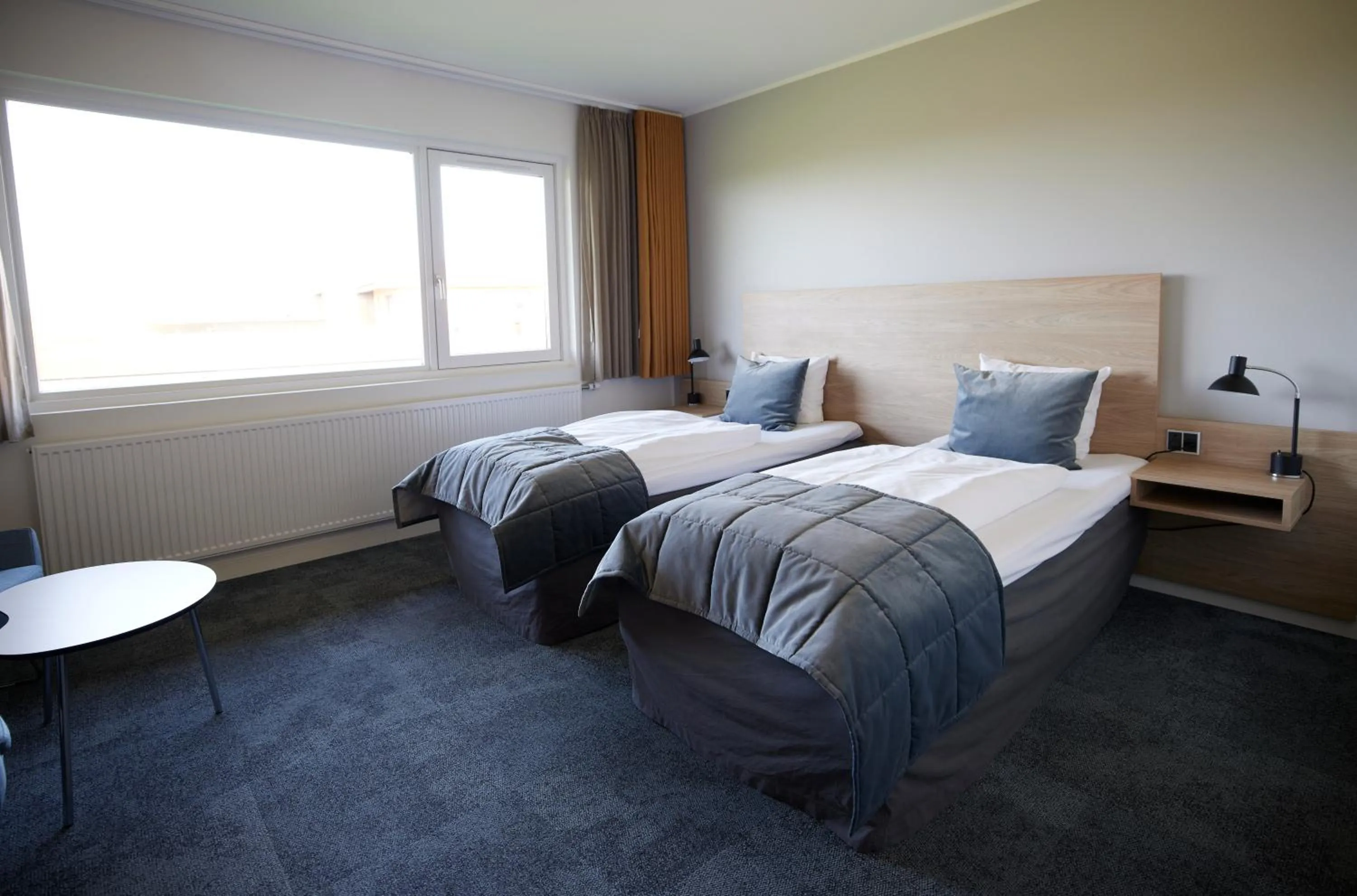 Bedroom, Bed in Trinity Hotel og Konference