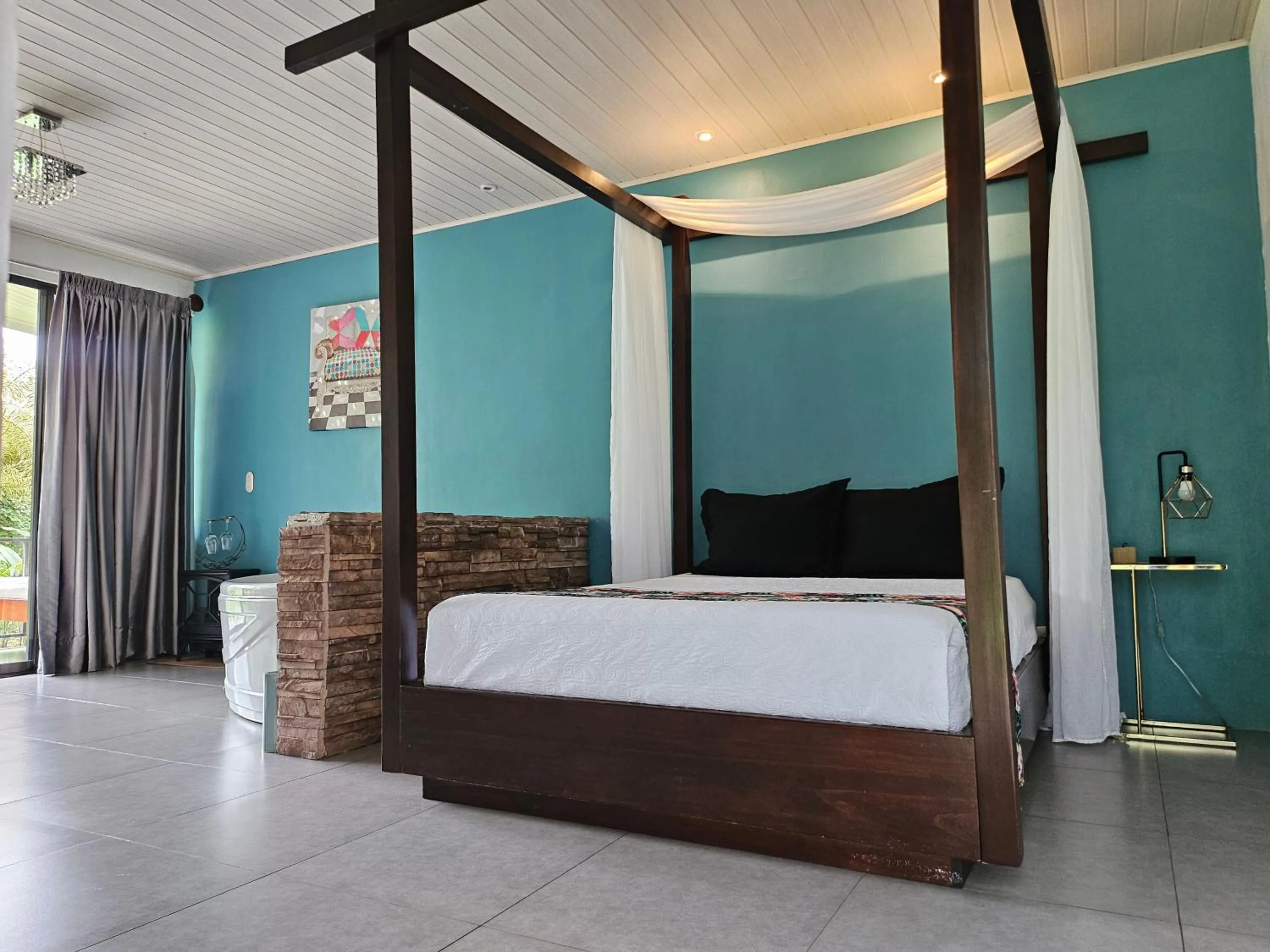 Bed in Yellow Tree Suites