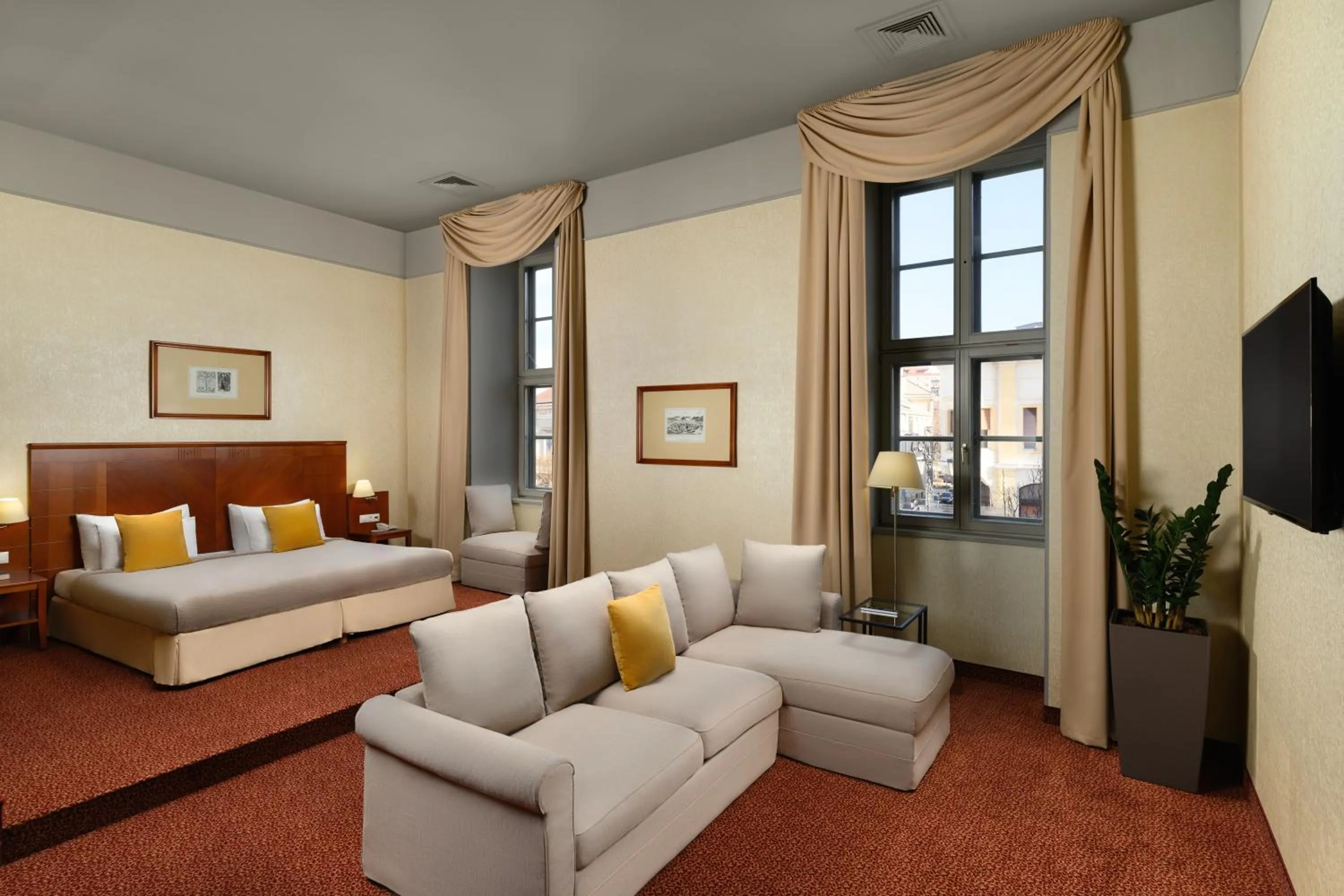 Seating area, Bed in Mercure Szekesfehervar Magyar Kiraly