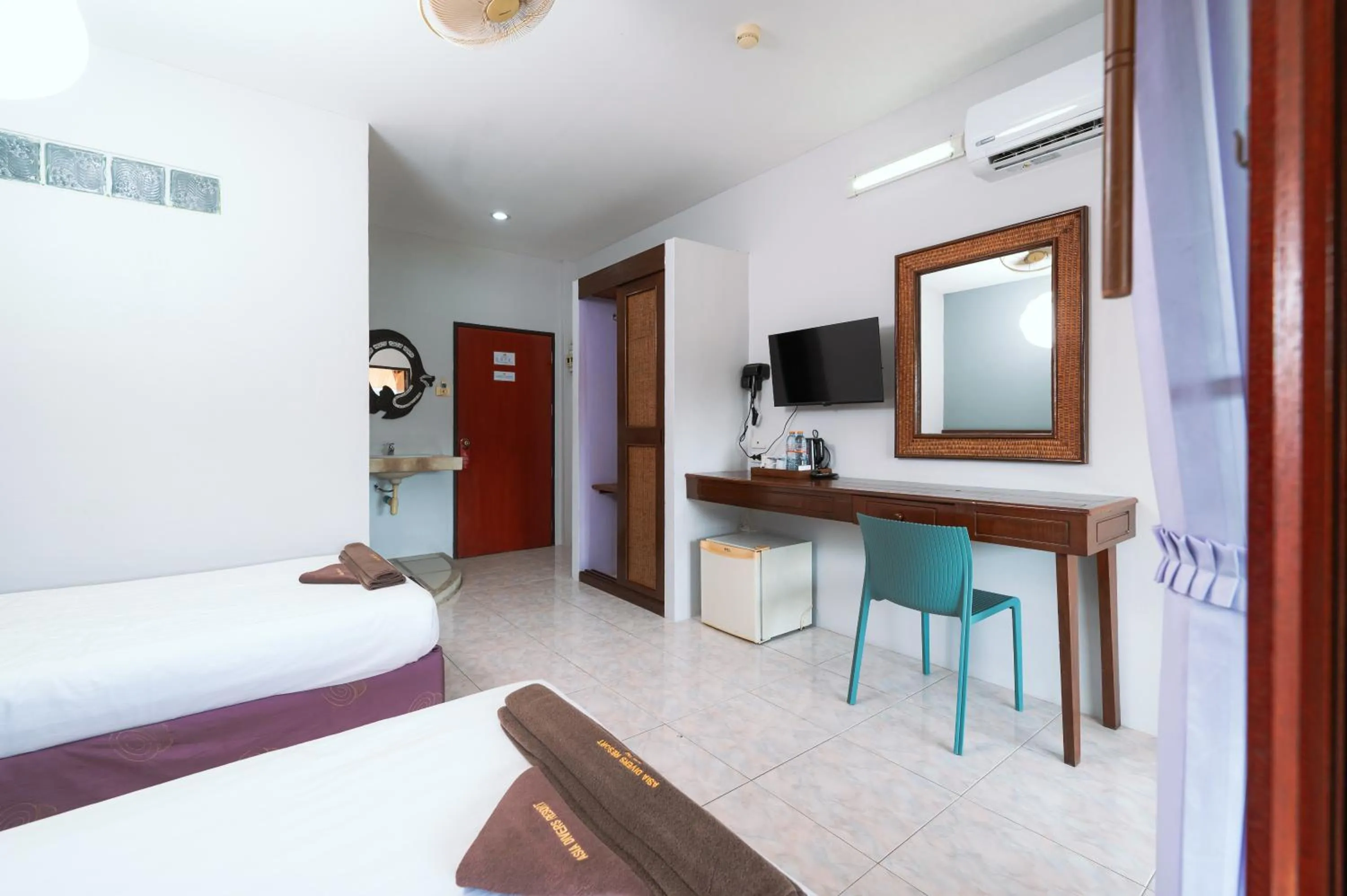 Bed in Asia Divers Resort