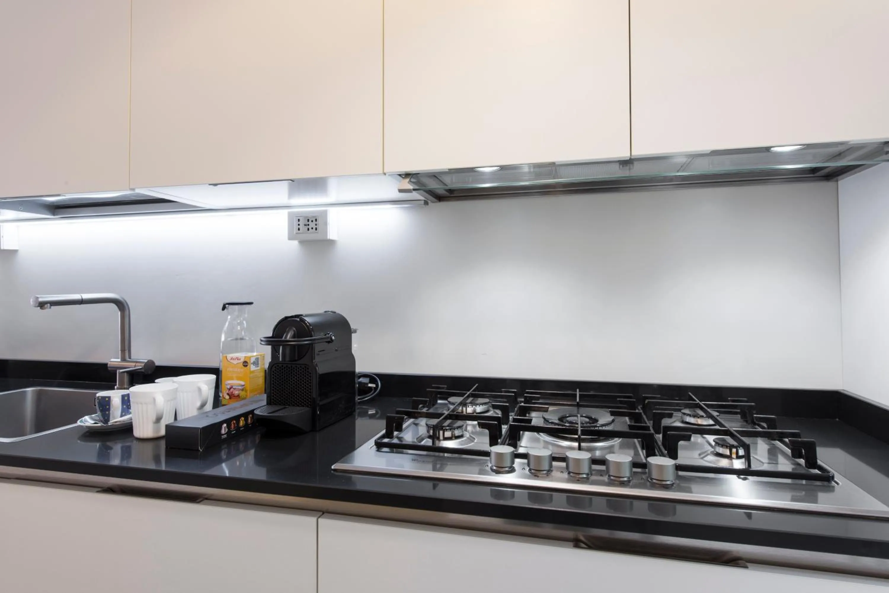 Kitchen or kitchenette in Mila Apartments Via Savona