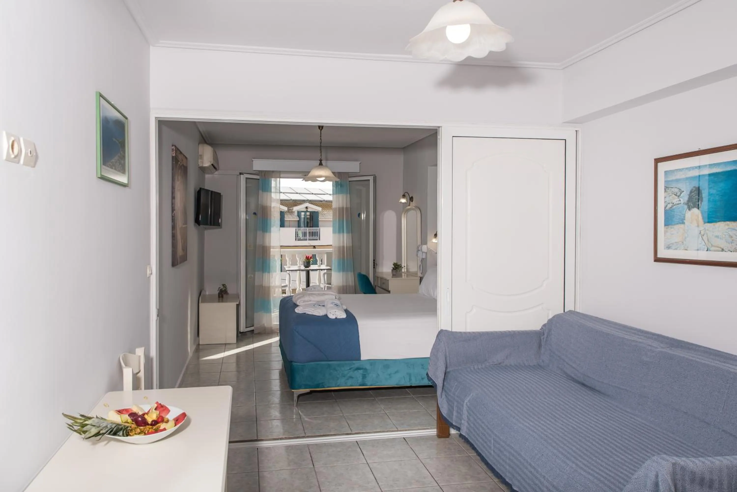 Bed in Denise Beach Hotel