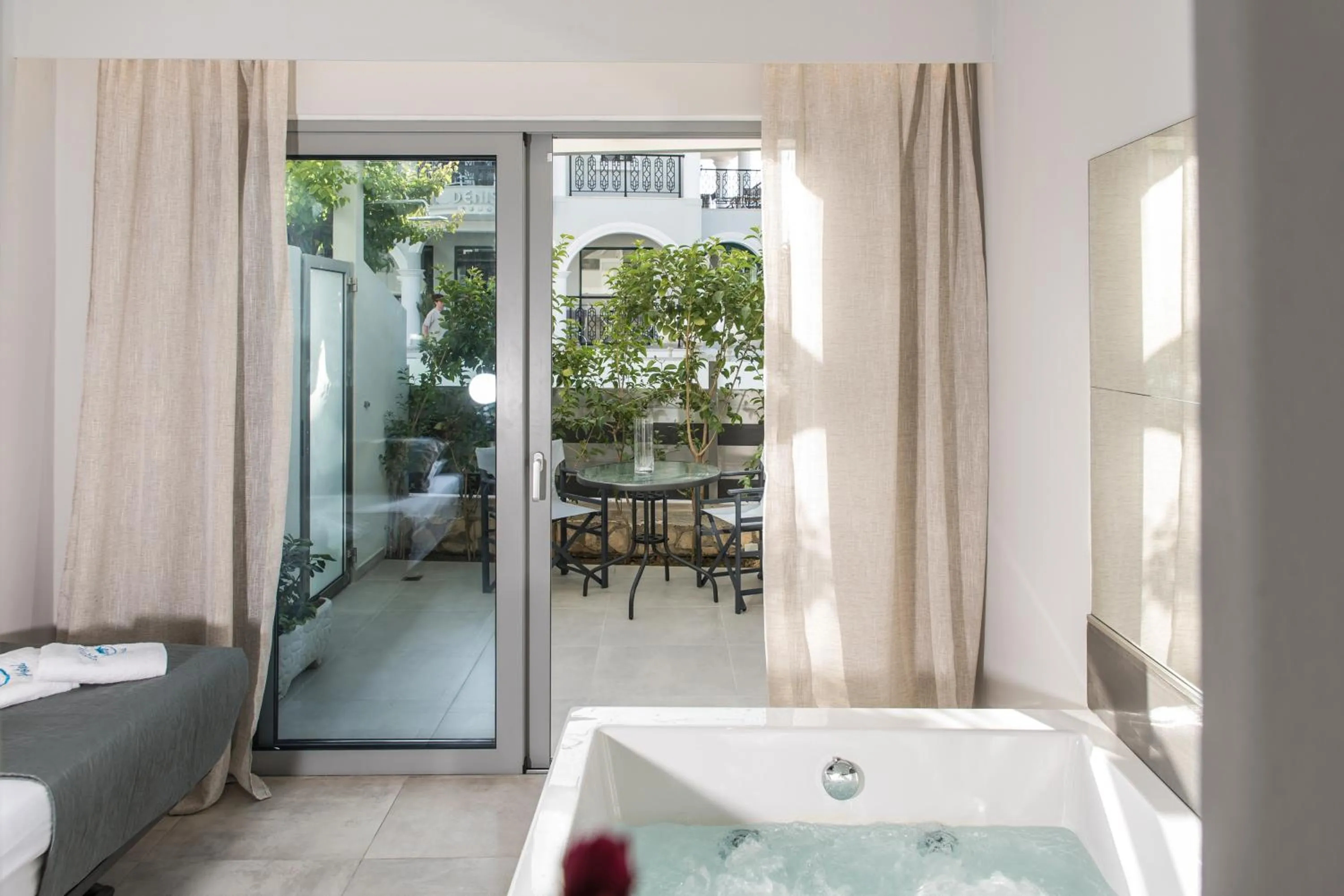 Patio in Denise Beach Hotel