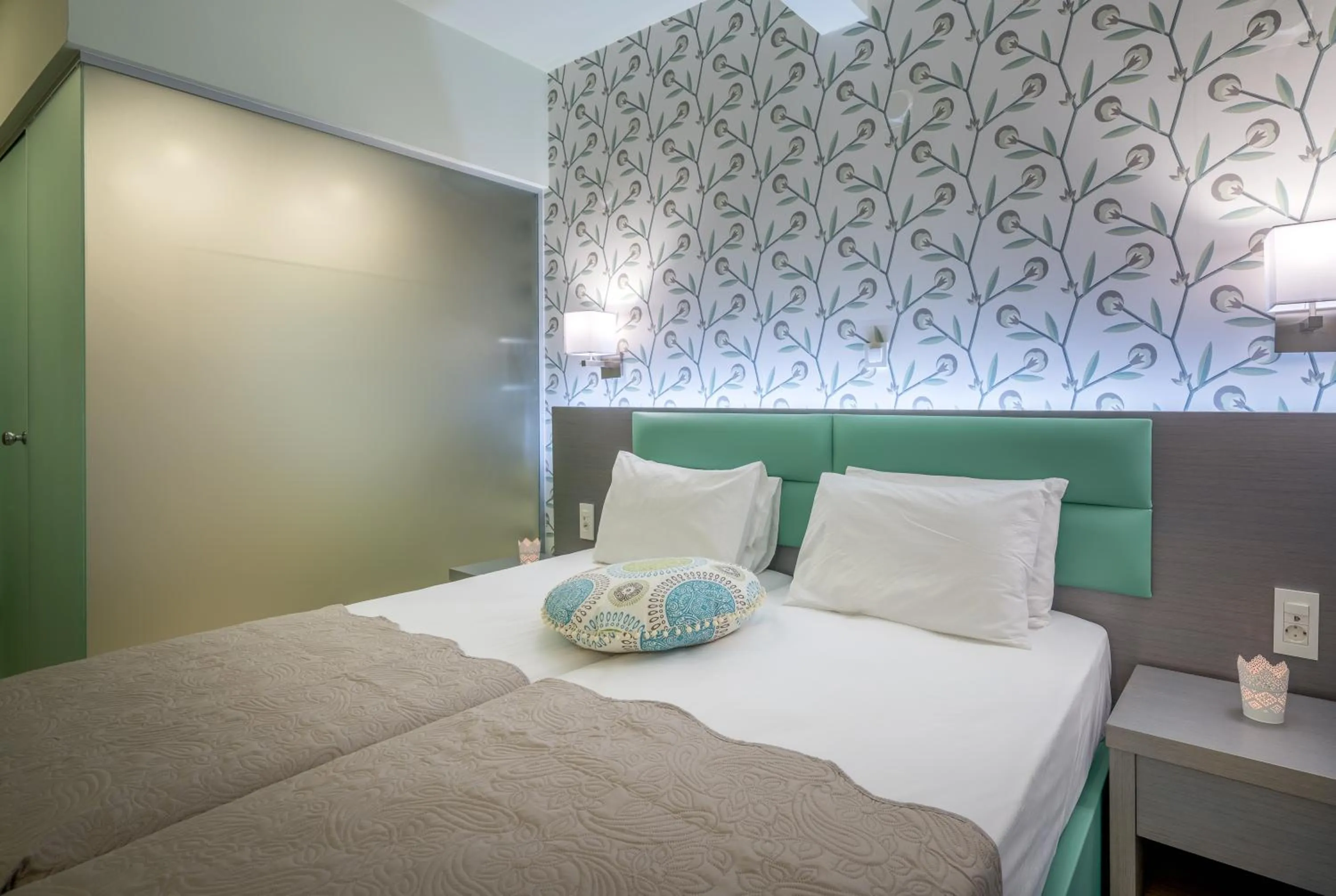 Bed in Denise Beach Hotel