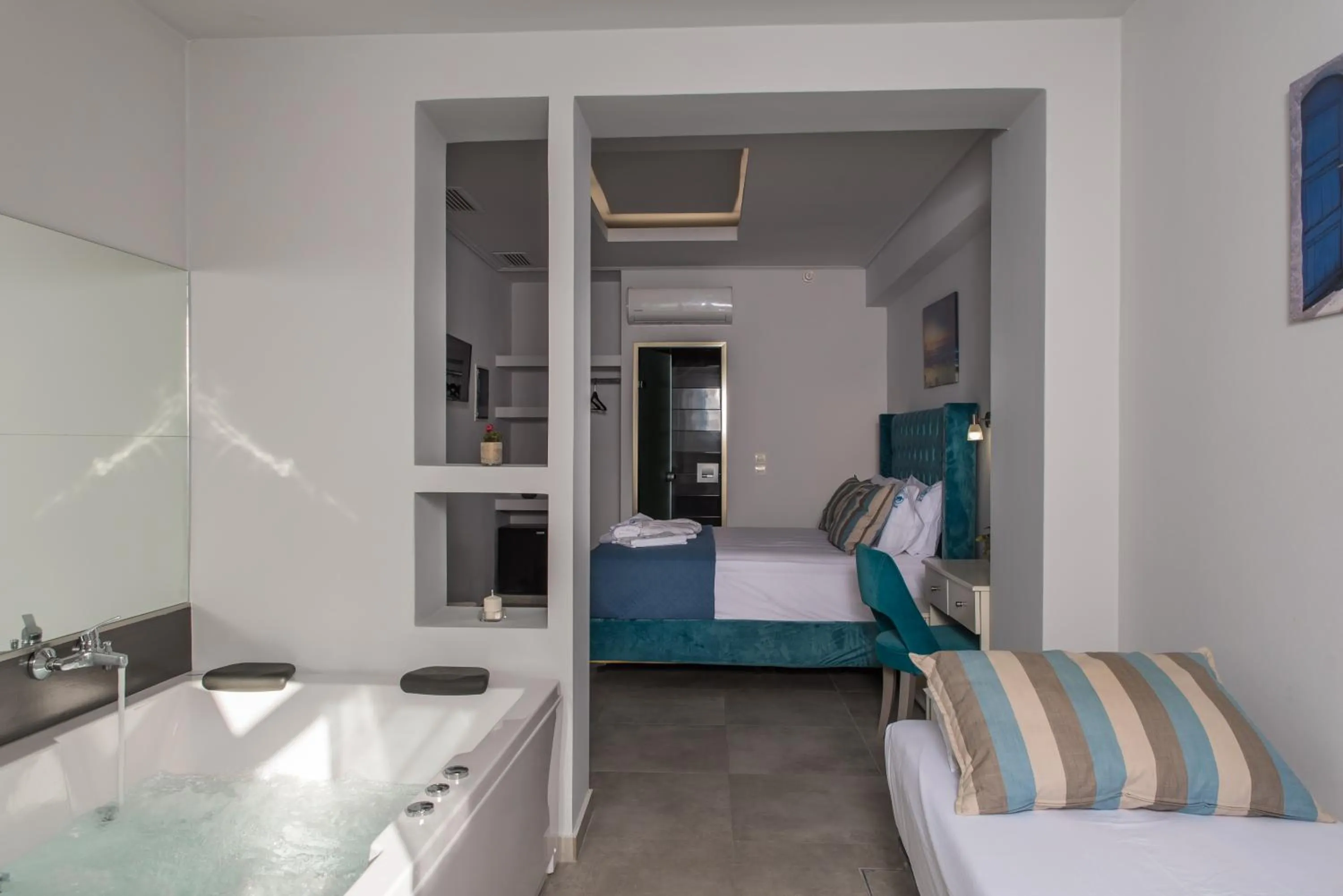 Bed in Denise Beach Hotel