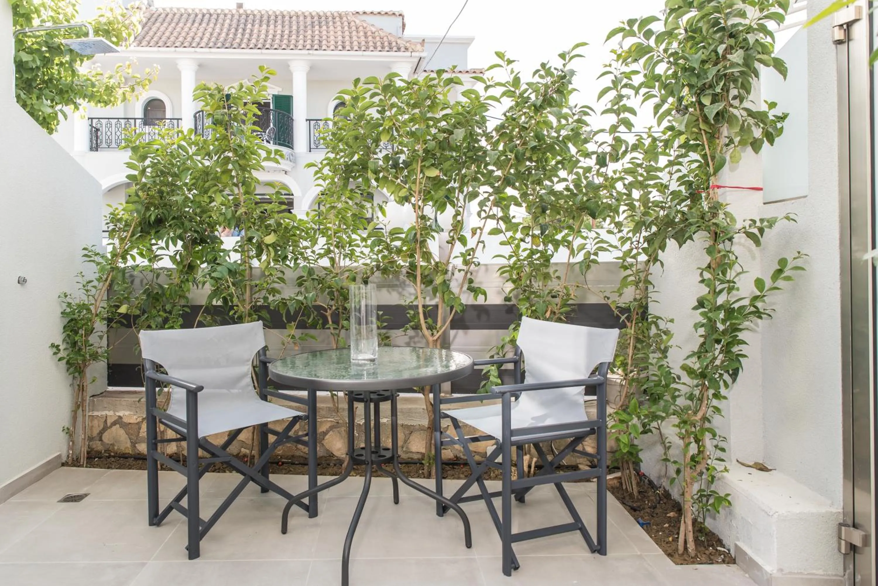 Patio in Denise Beach Hotel
