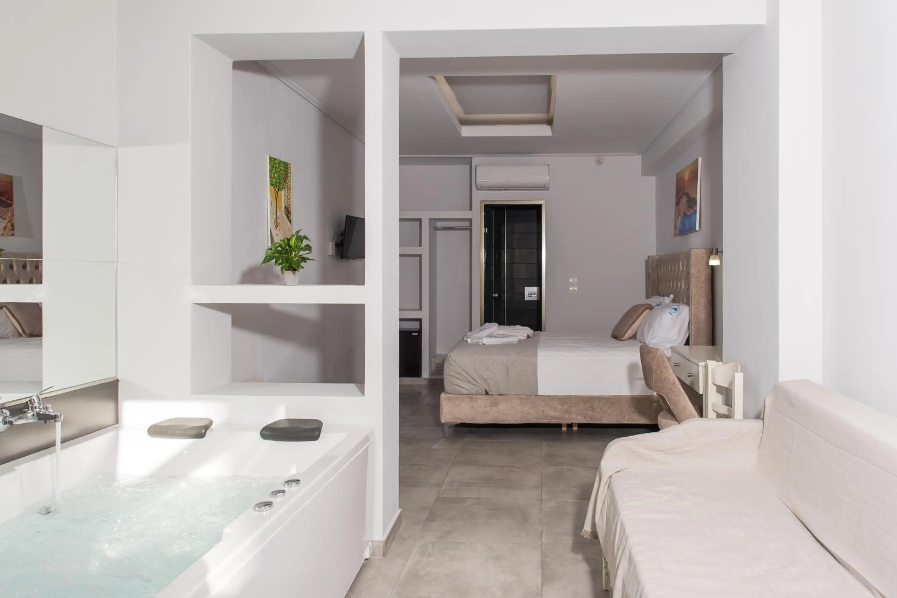 Bed in Denise Beach Hotel