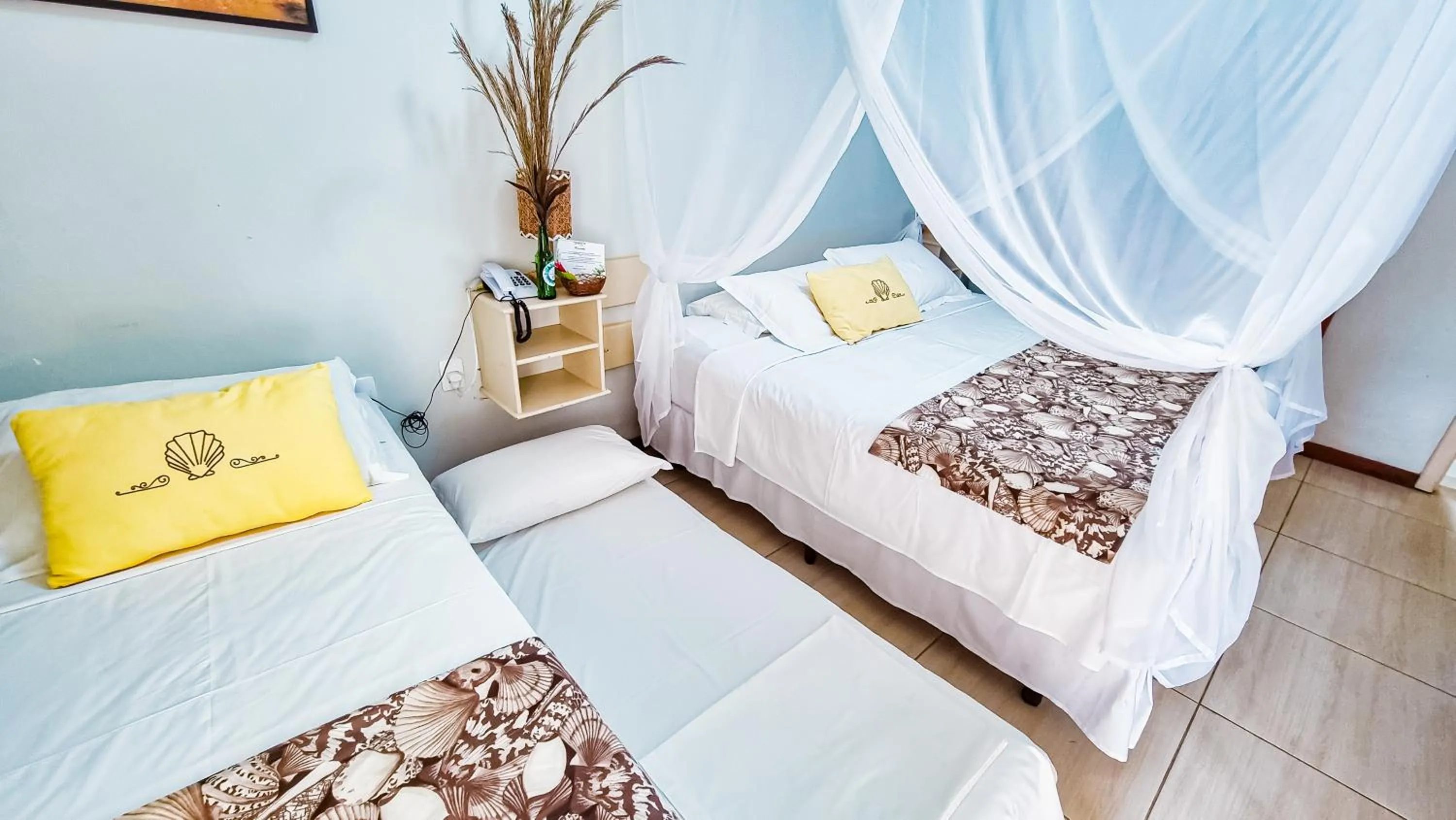 Bed in Pousada Portal da Concha