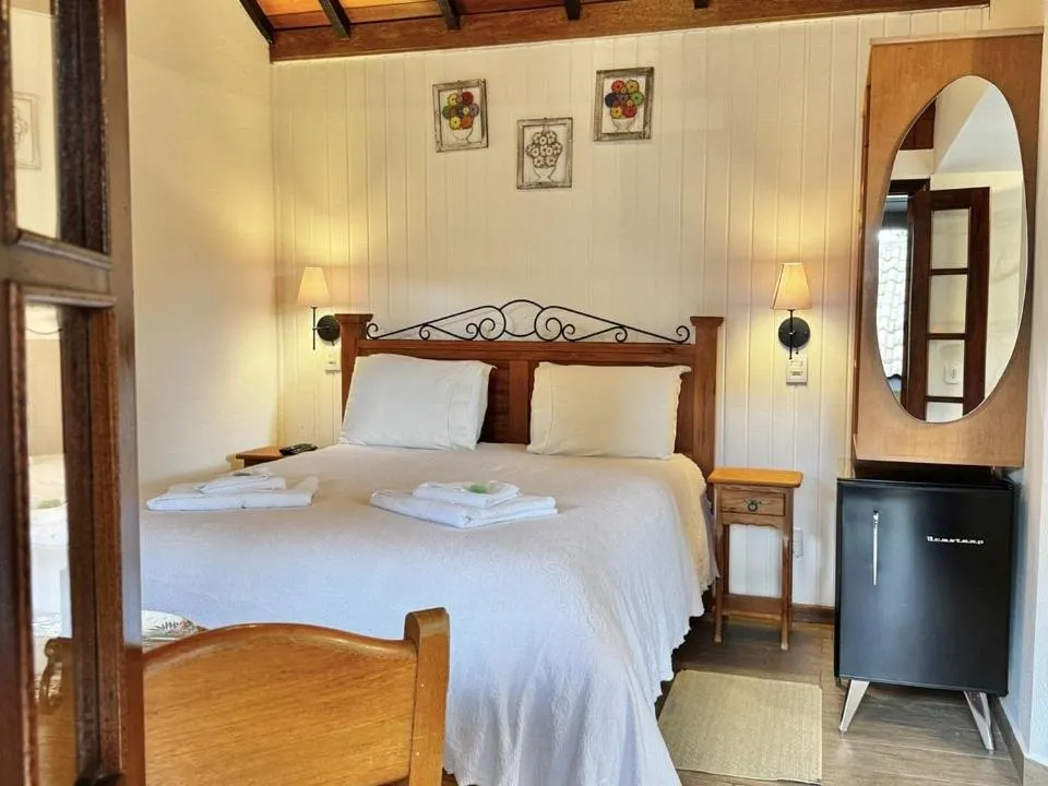 Bed in Pousada Alto de Monte Verde