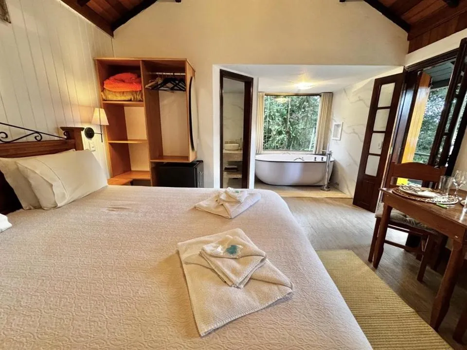 Bed in Pousada Alto de Monte Verde