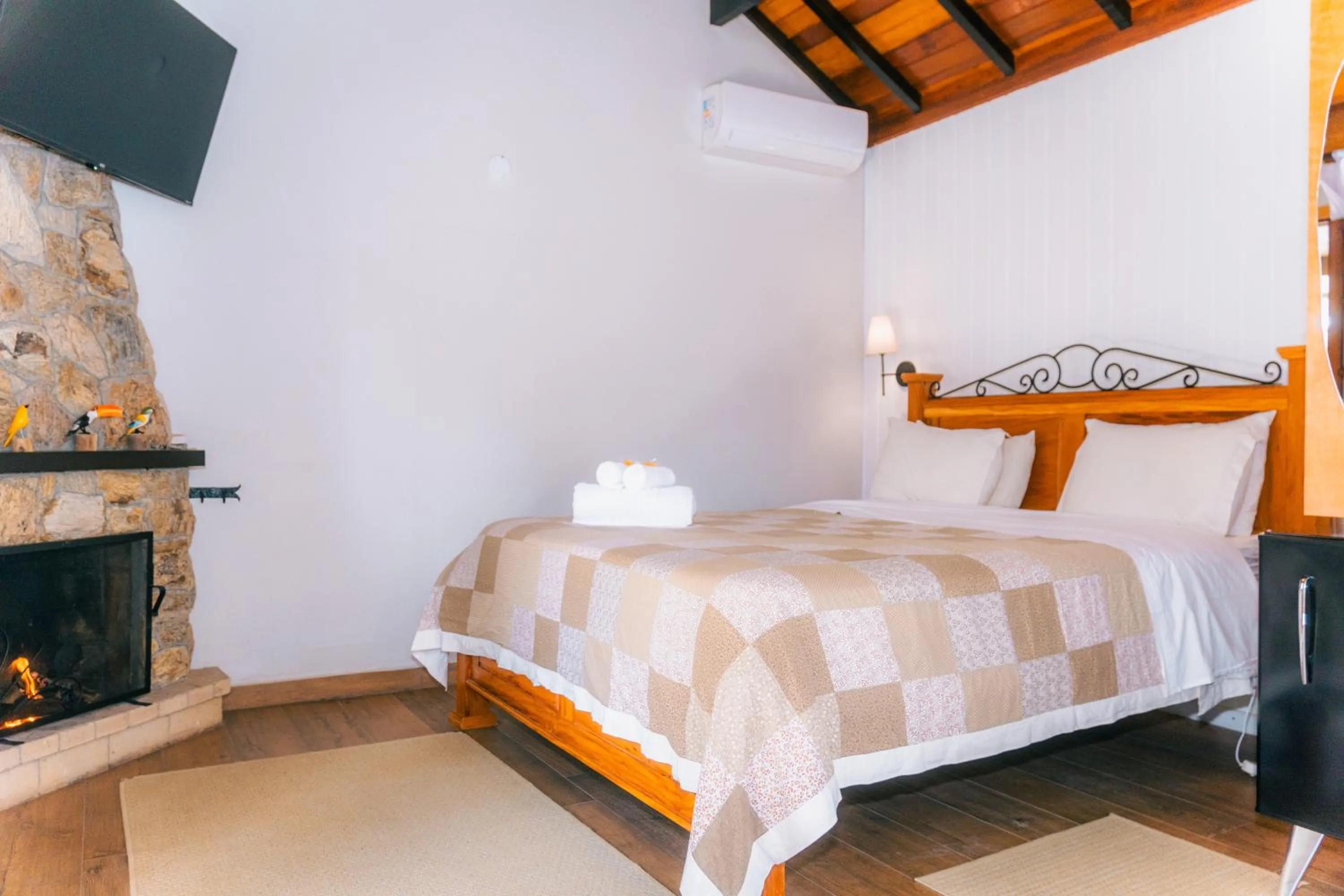 Bed in Pousada Alto de Monte Verde