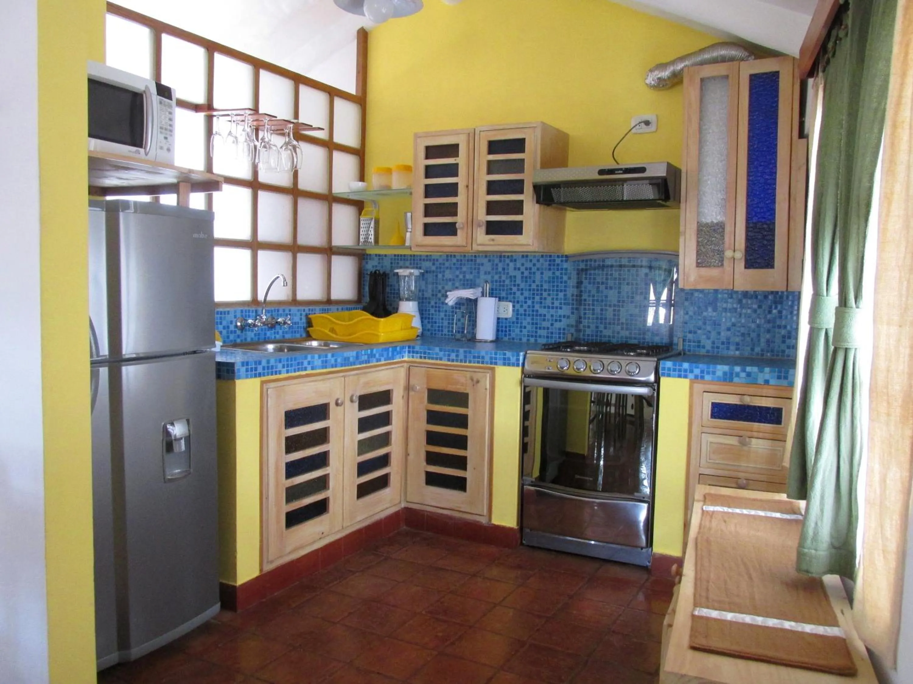 Kitchen or kitchenette in Quinua Boutique Apartments